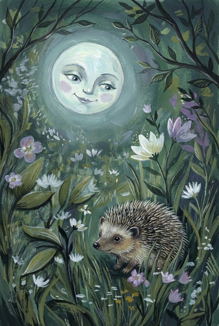 Whimsical folk-style illustration of a small hedgehog nestled among tall grass and wildflowers, under a glowing full moon with a soft, smiling face. The moonlight casts a gentle glow over the scene, framed by leafy branches and delicate blossoms in a magical nighttime forest setting.
