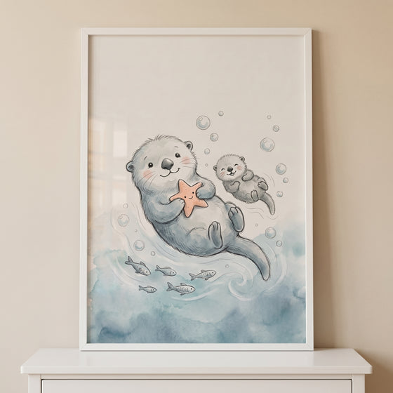 Watercolor smiling starfish holding otter wall art depicts two happy otters floating among bubbles and small fish.