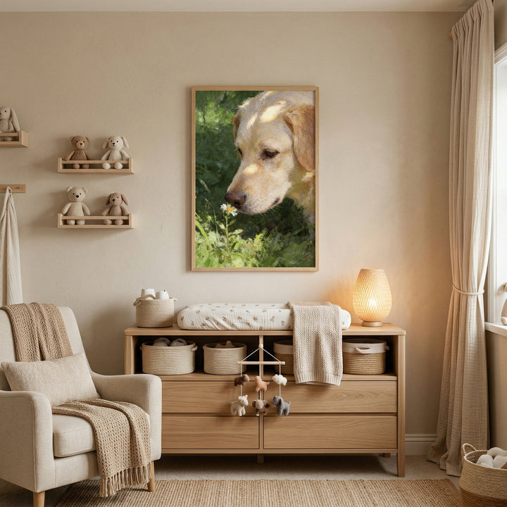 Cozy neutral nursery with wooden dresser and soft textiles featuring a framed painting of a yellow labrador sniffing a small white flower above the changing area. Warm lighting plush toys and natural textures create a calm inviting space centered around the dog artwork.