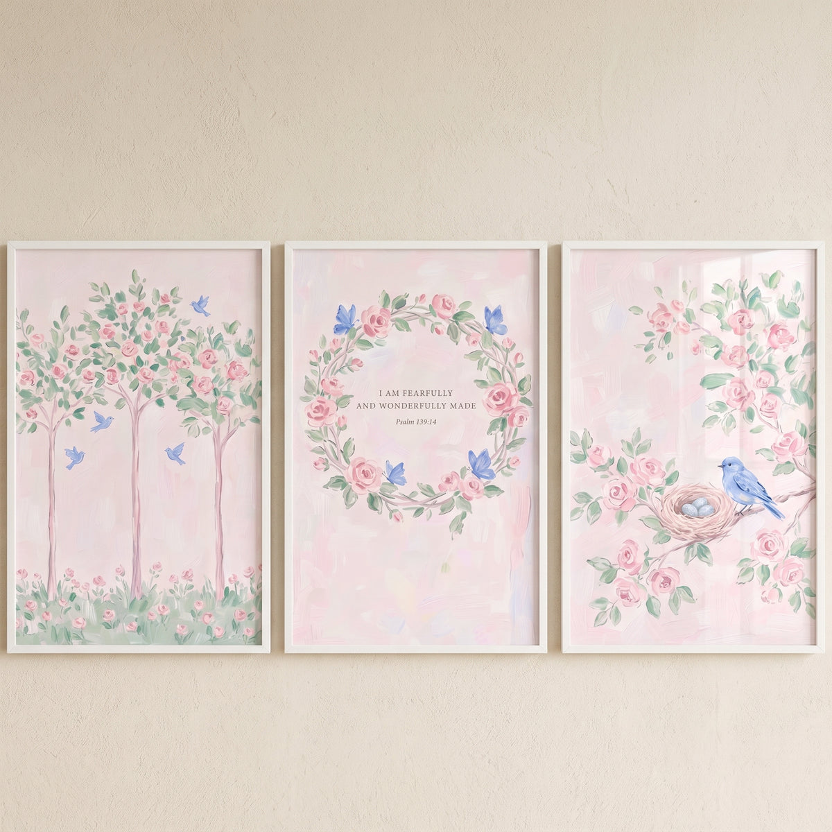 Soft blue bird garden wall art set of 3 with pink floral trees, a wreath with scripture, and a nesting bird.