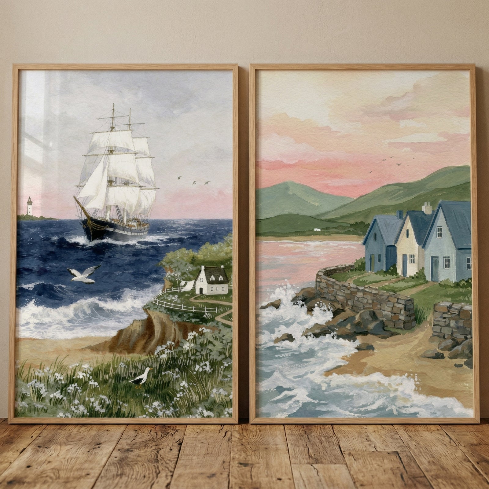 Sailing ship and coastal cottages beside mountains in this soft blue coastal landscape wall art set of 2.