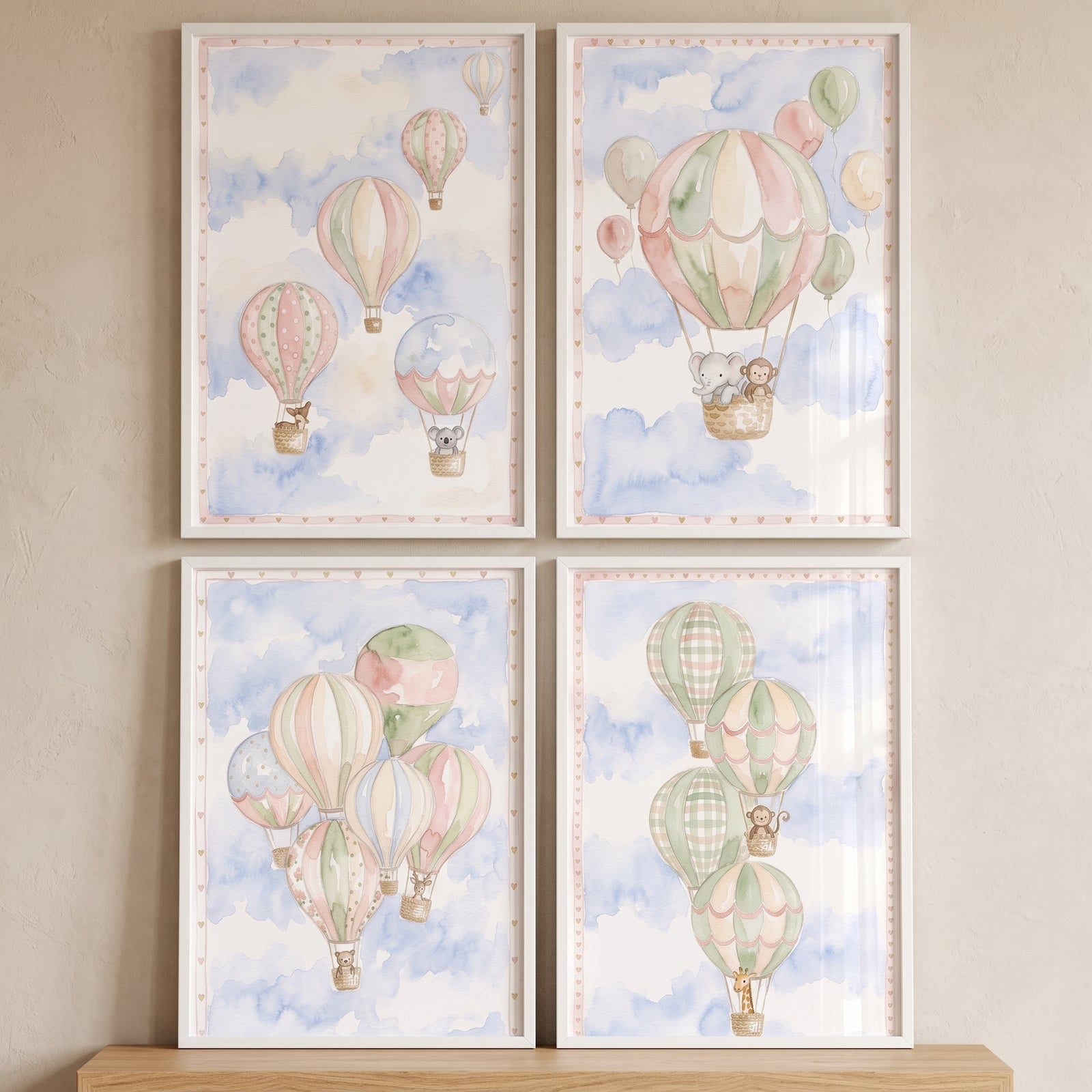 Soft blue watercolor balloon wall art set of 4 featuring hot air balloons and animals drifting through pastel clouds.
