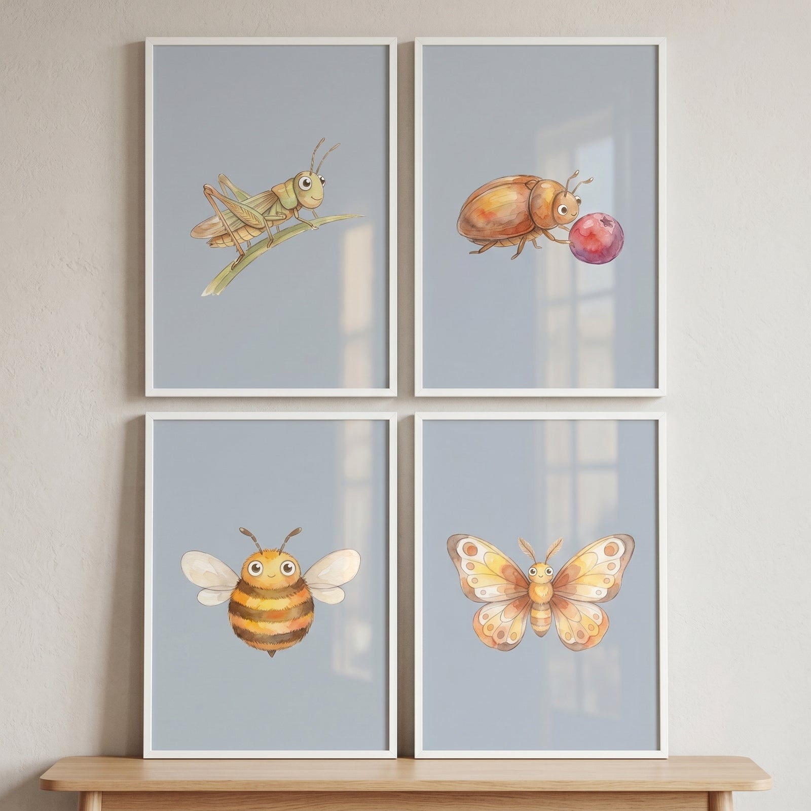 White framed grasshopper, beetle, bee, and butterfly in a soft blue watercolor insect wall art set of 4.