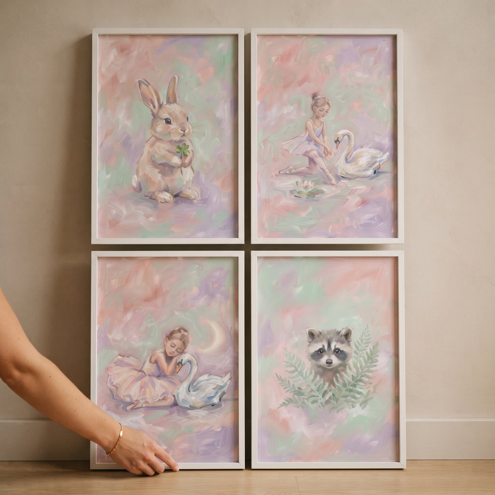 Soft blush girls room wall art set of 4 featuring a rabbit, raccoon, and ballerinas with swans in pastel colors.