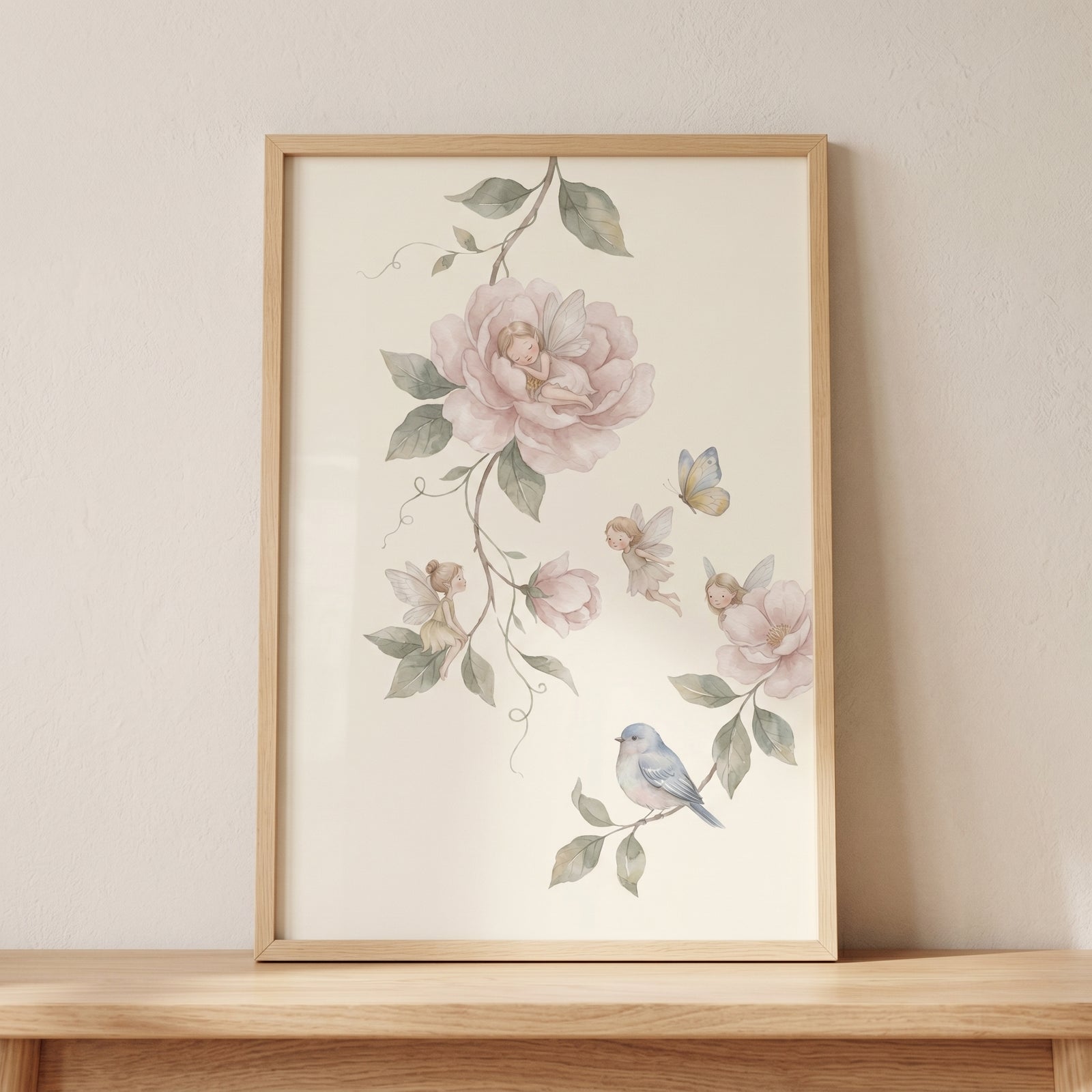 Soft blush peony fairy wall art in a wooden frame with whimsical fairies, pink flowers, a blue bird, and a butterfly.