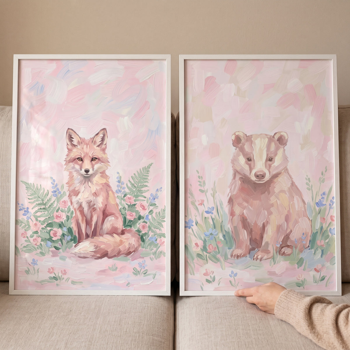 Soft brushstroke forest animals wall art set of 2 featuring a fox and a badger in floral pastel pink tones.