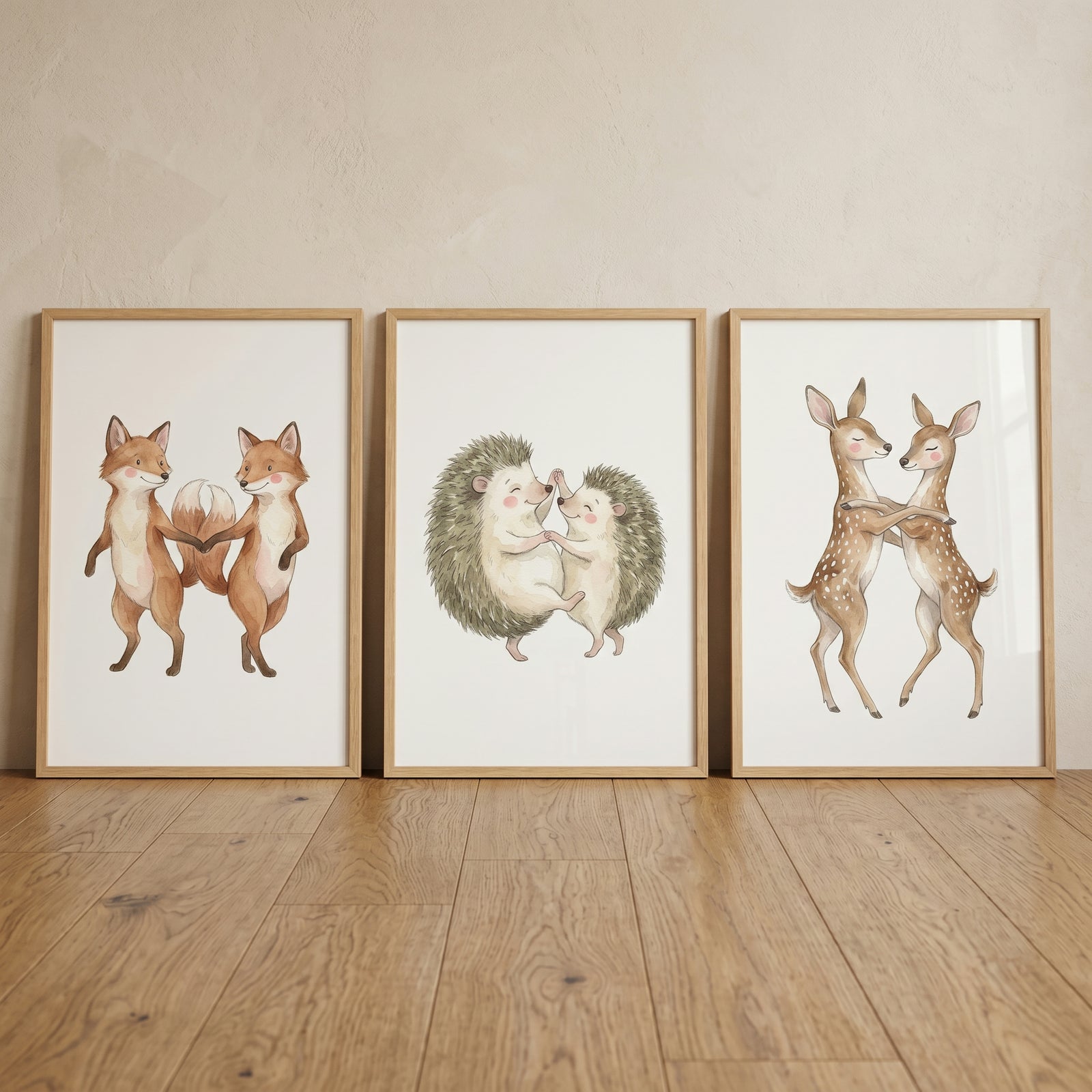 Framed soft dancing woodland animal wall art set of 3 shows foxes, hedgehogs, and deer in pairs on a wood floor.