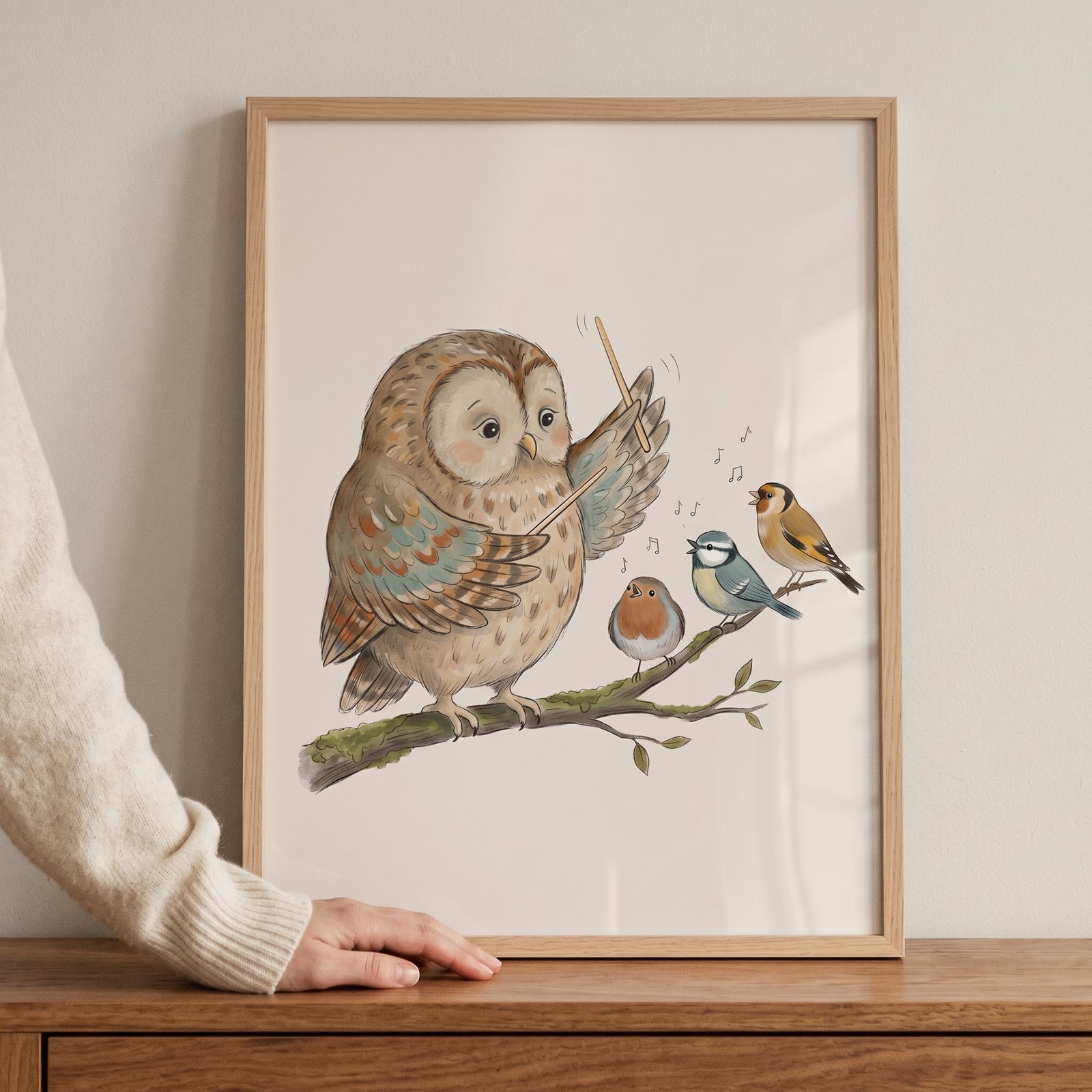 Soft earth tone owl wall art of an owl conducting three singing garden birds on a mossy branch in a wooden frame.