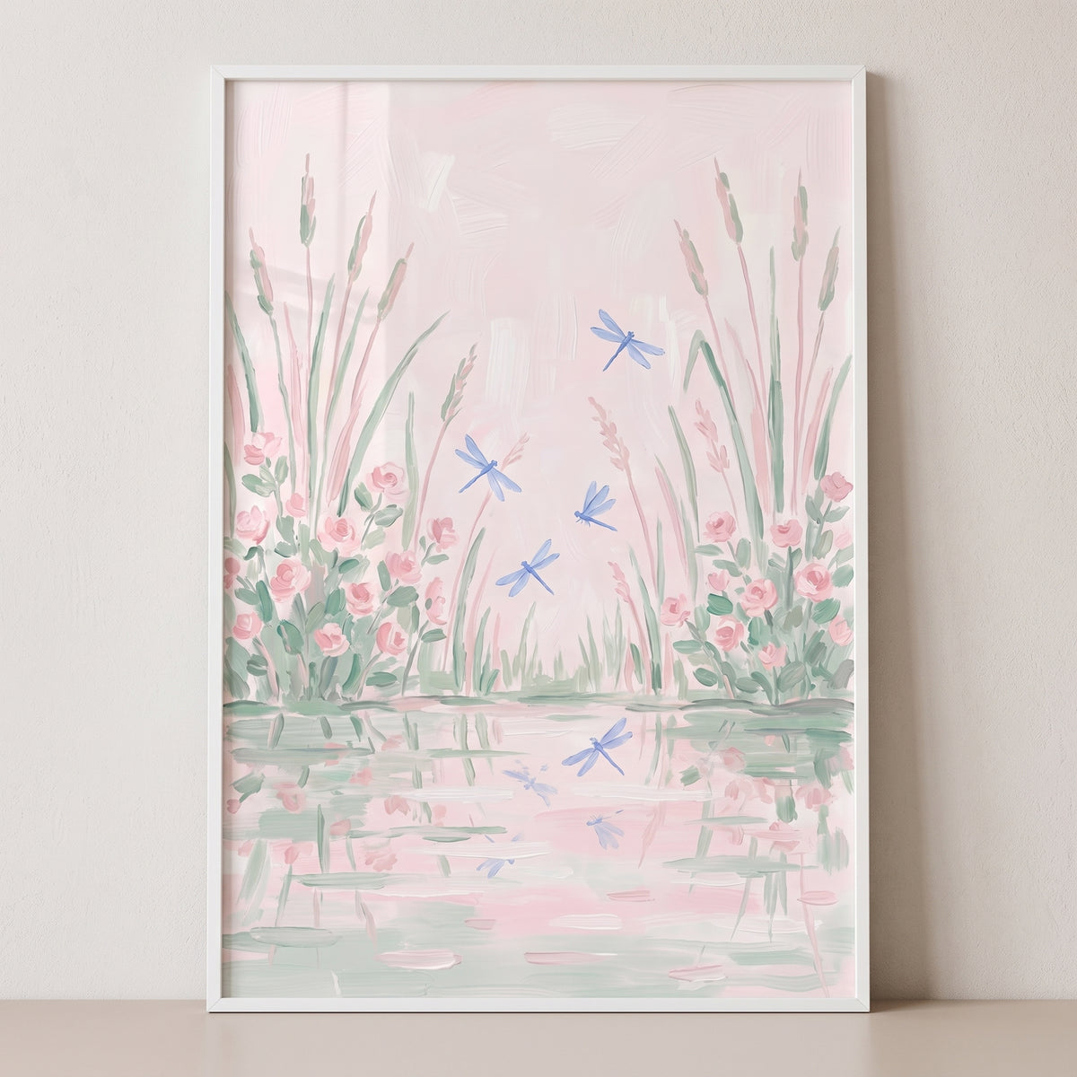 Soft flying blue dragonfly floral wall art shows pink blossoms and reeds reflected in a calm, pastel pink pond.