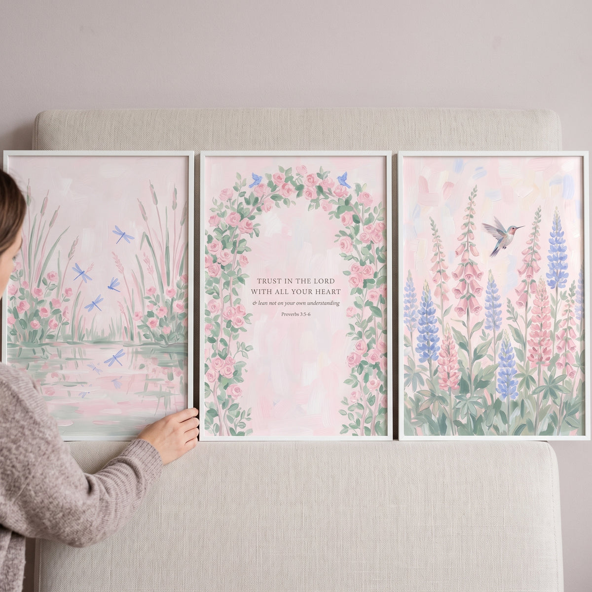 Soft garden nursery wall art set of 3 featuring dragonflies, a floral arch with a Bible verse, and a hummingbird.