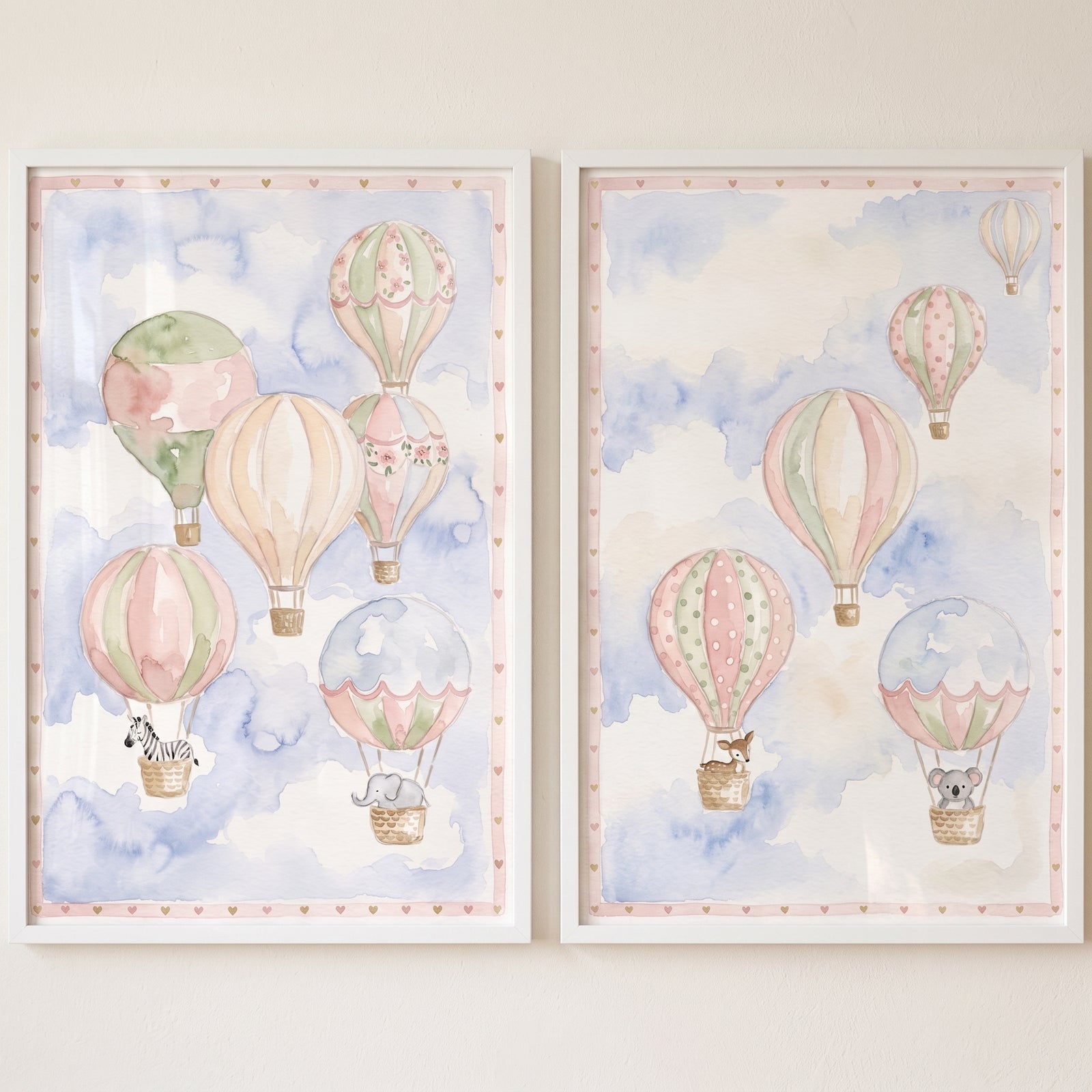 Soft hot air balloon wall art set of 2 featuring pastel watercolor animals like a zebra and koala in the sky.