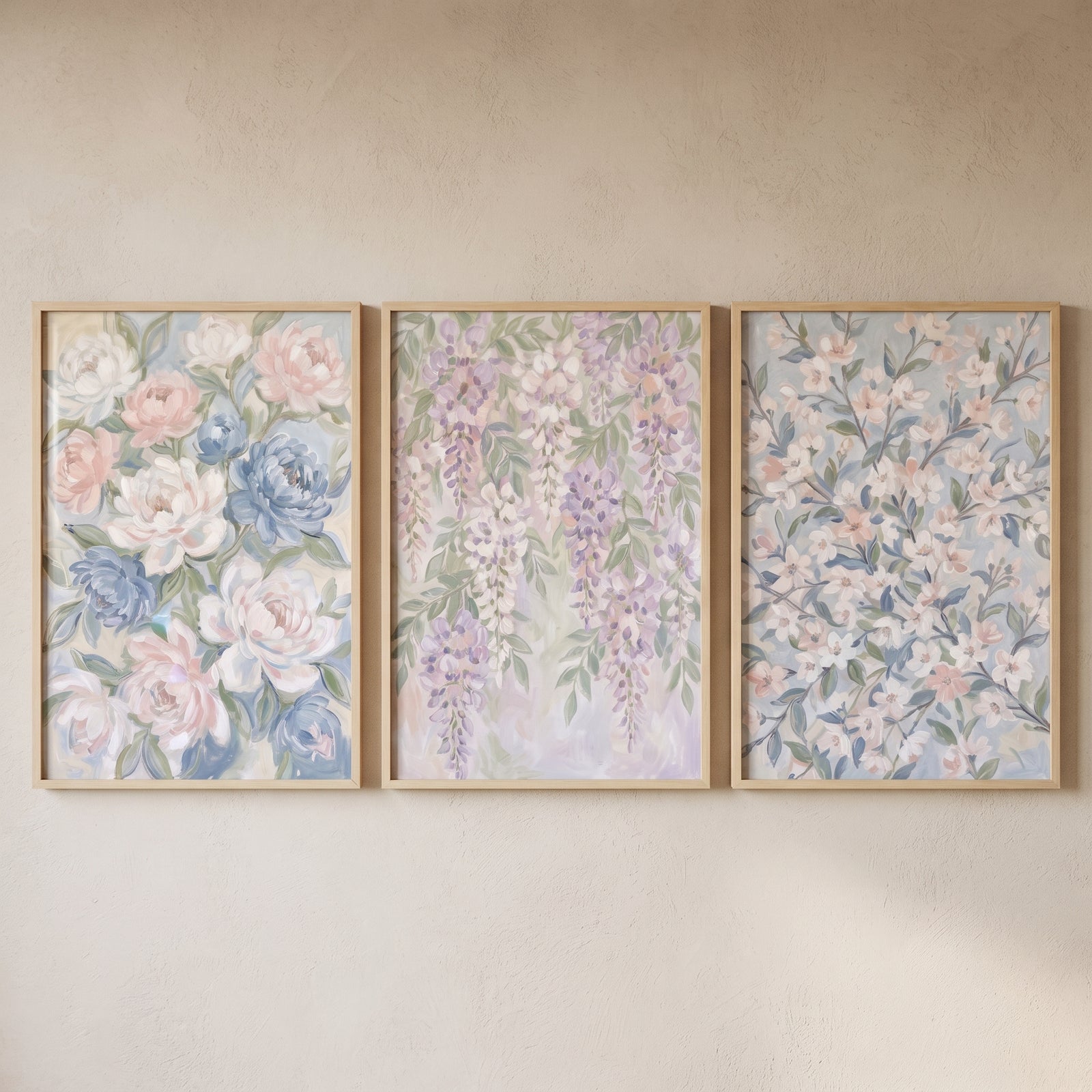 Framed soft impressionist spring blossom floral wall art set of 3 with pastel blue, pink, and purple flowers.