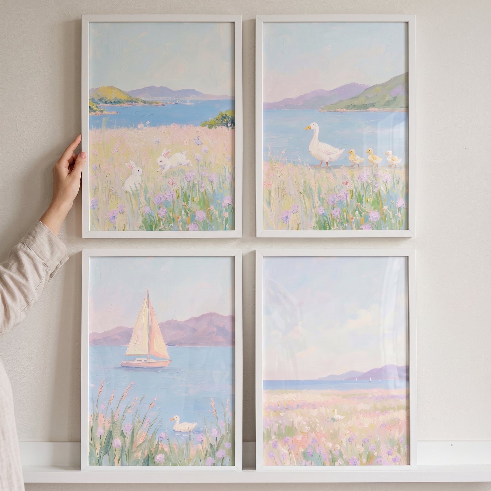 Soft lilac wildflower coastal wall art set of 4 featuring rabbits, geese, and a sailboat in light pastel seaside scenes.