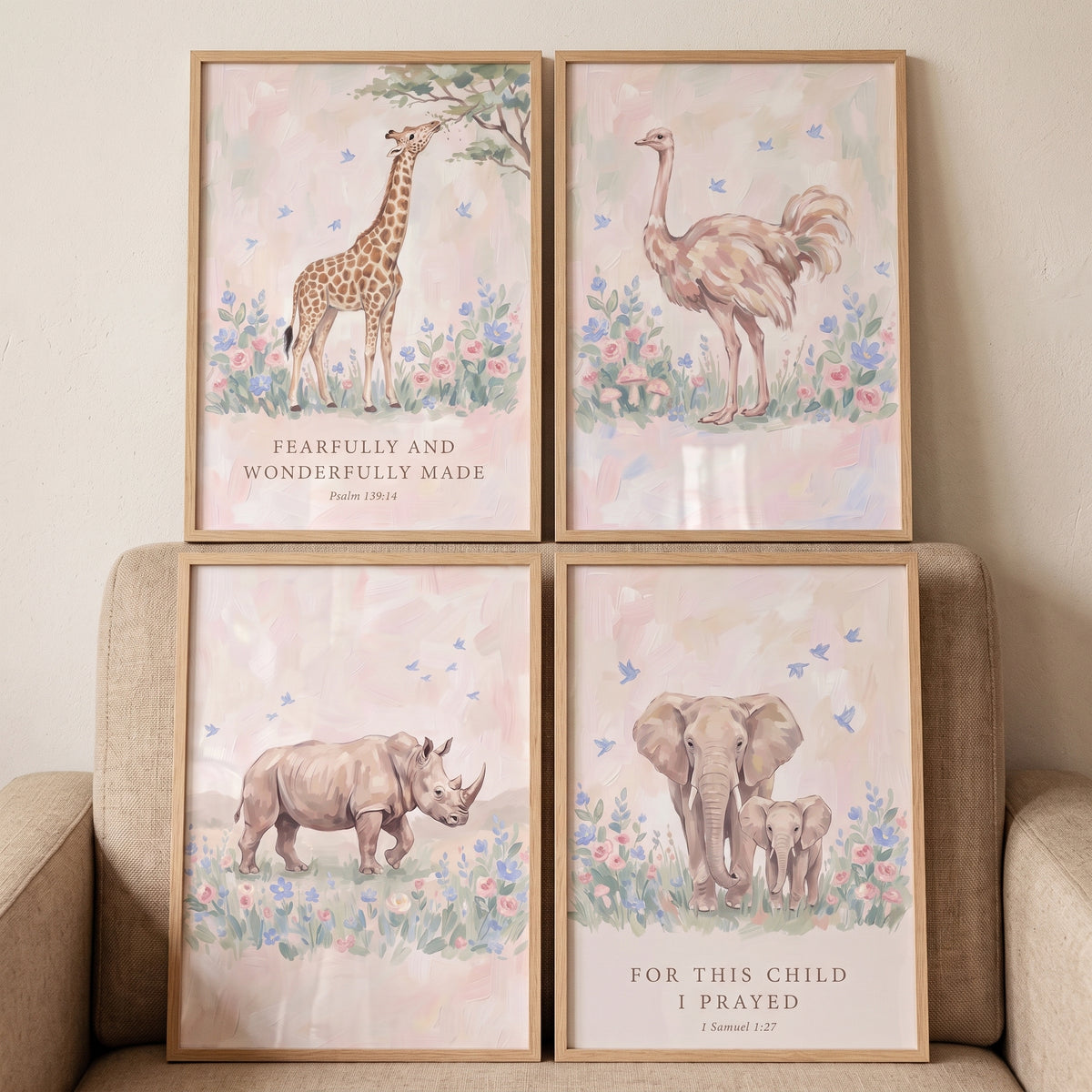 Soft meadow african animals wall art set of 4 featuring a giraffe, ostrich, rhino, and elephants with scripture.