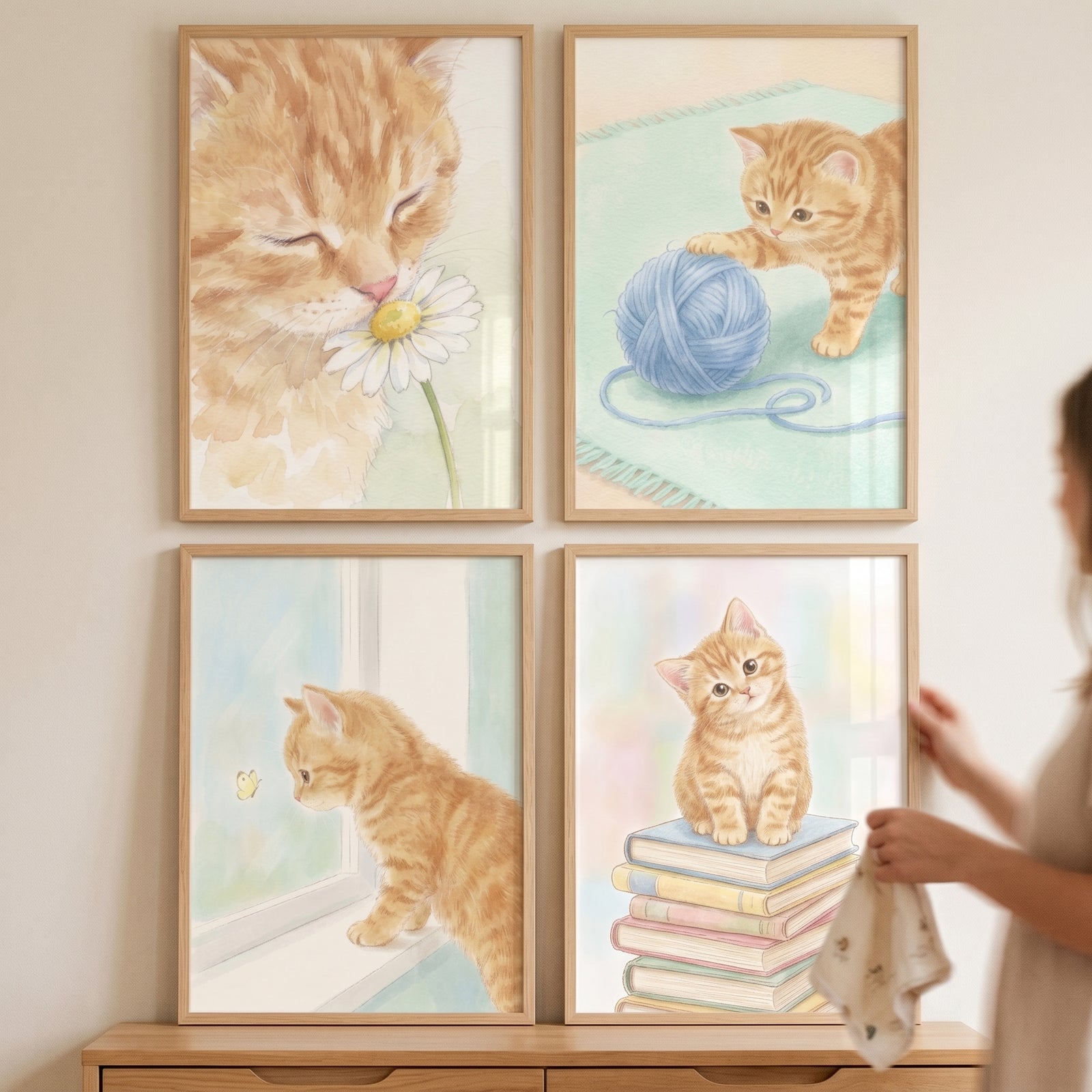 Soft orange tabby kitten artwork set of 4 features a cat with a flower, yarn, butterfly, and books in wood frames.