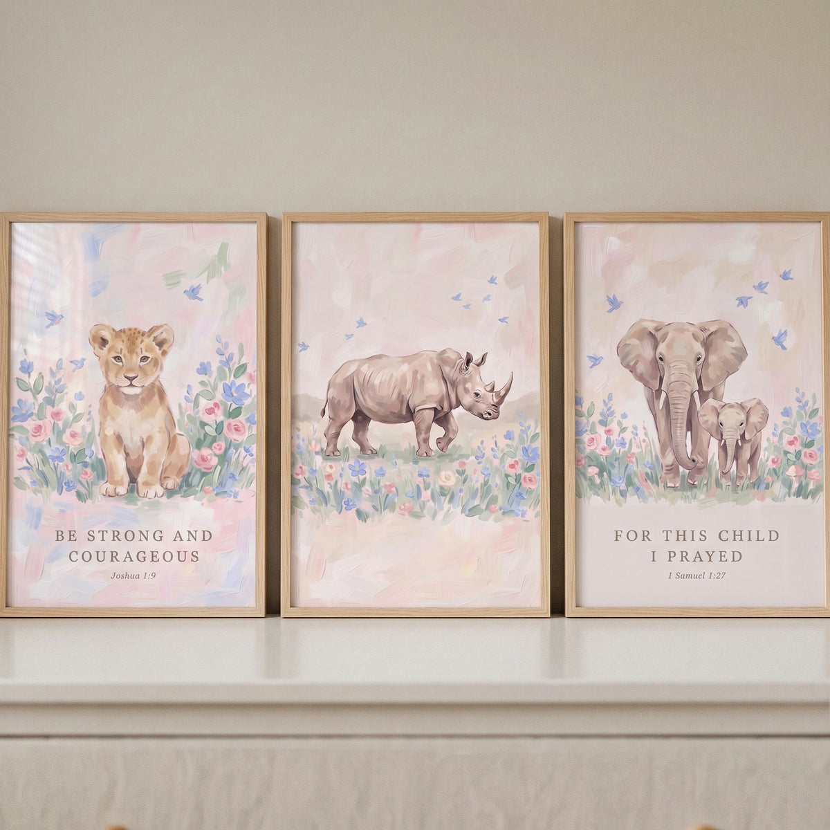 Soft palette savanna animals wall art set of 3 with a lion cub, rhino, and elephants featuring Bible verses.