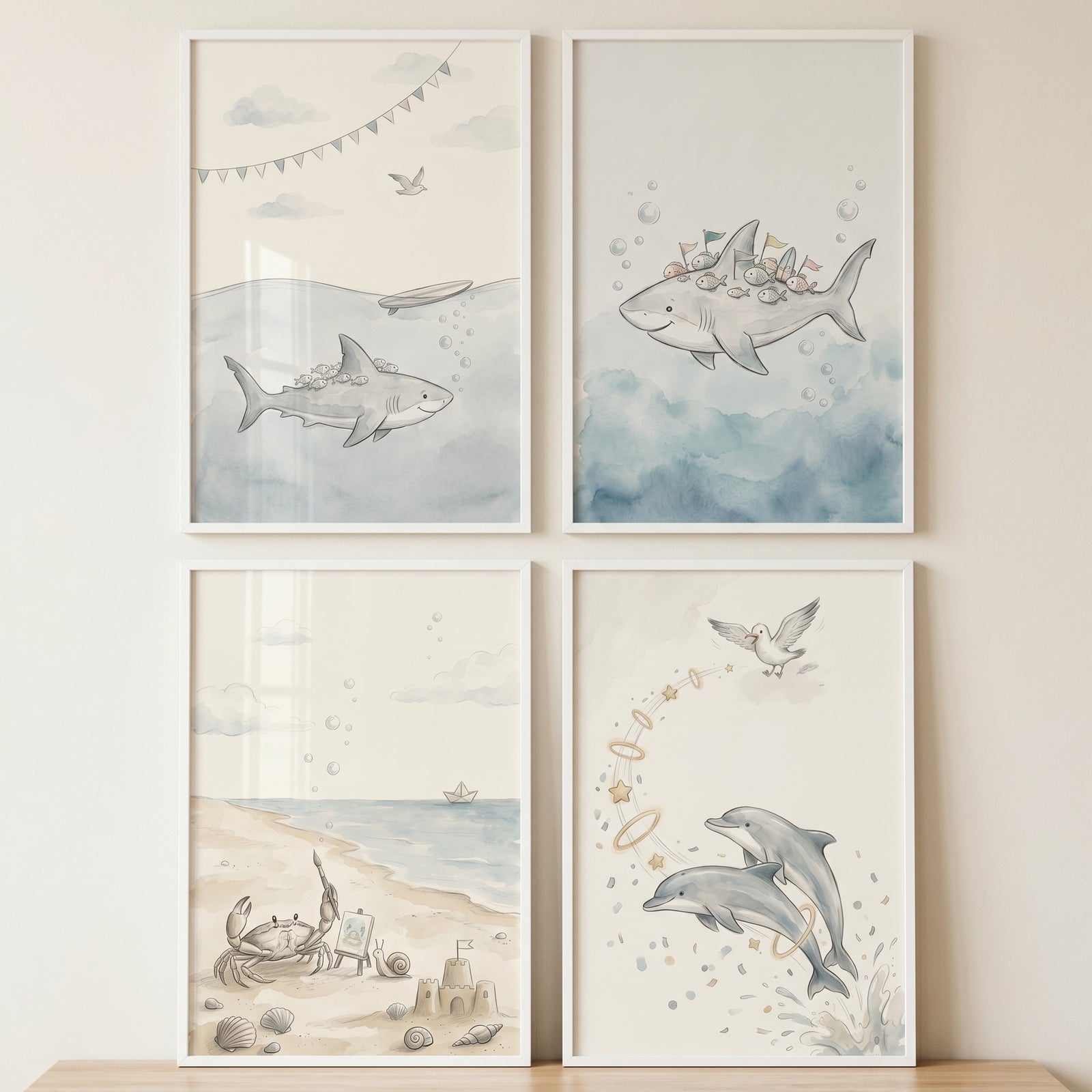 Soft palette sea creatures wall art set of 4 featuring watercolor sharks, dolphins, and a crab at the beach.