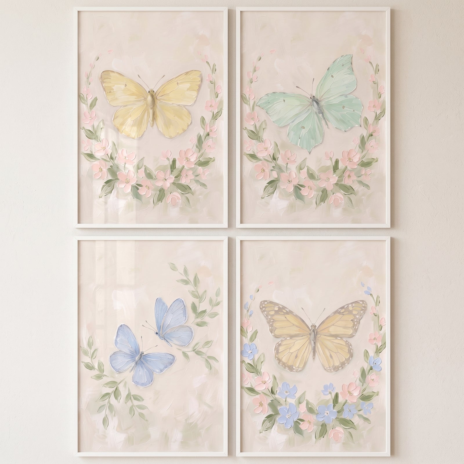 Soft pastel botanical butterfly wall art set of 4 featuring delicate butterflies and floral wreaths in white frames.