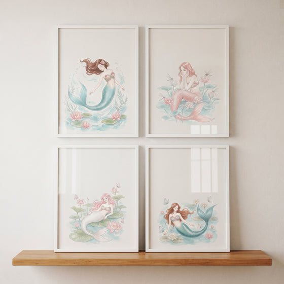 Soft pastel floral mermaid wall art set of 4 in white frames hanging on a wall above a wooden shelf.
