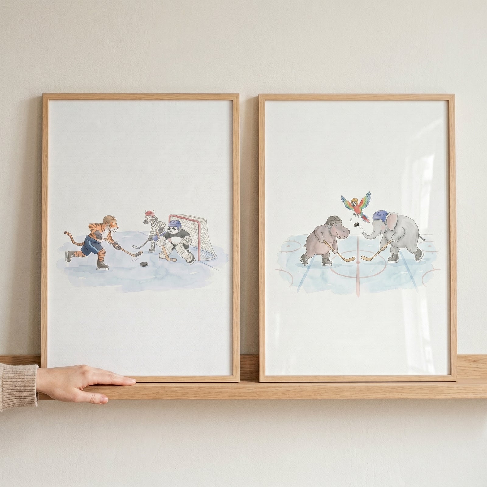 Soft pastel hockey animals print set of 2 showing a tiger, panda, zebra, hippo, and elephant playing on ice.