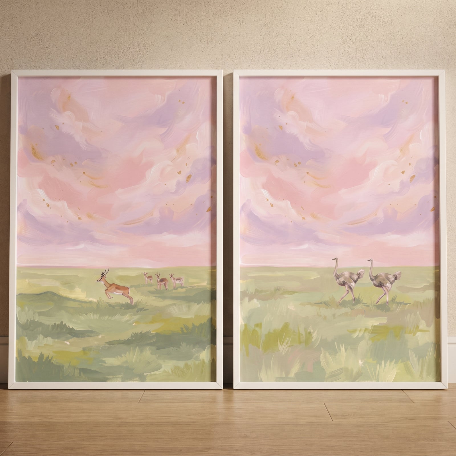 Soft pastel safari animals wall art set of 2 with leaping antelope and walking ostriches under a pink and purple sky.