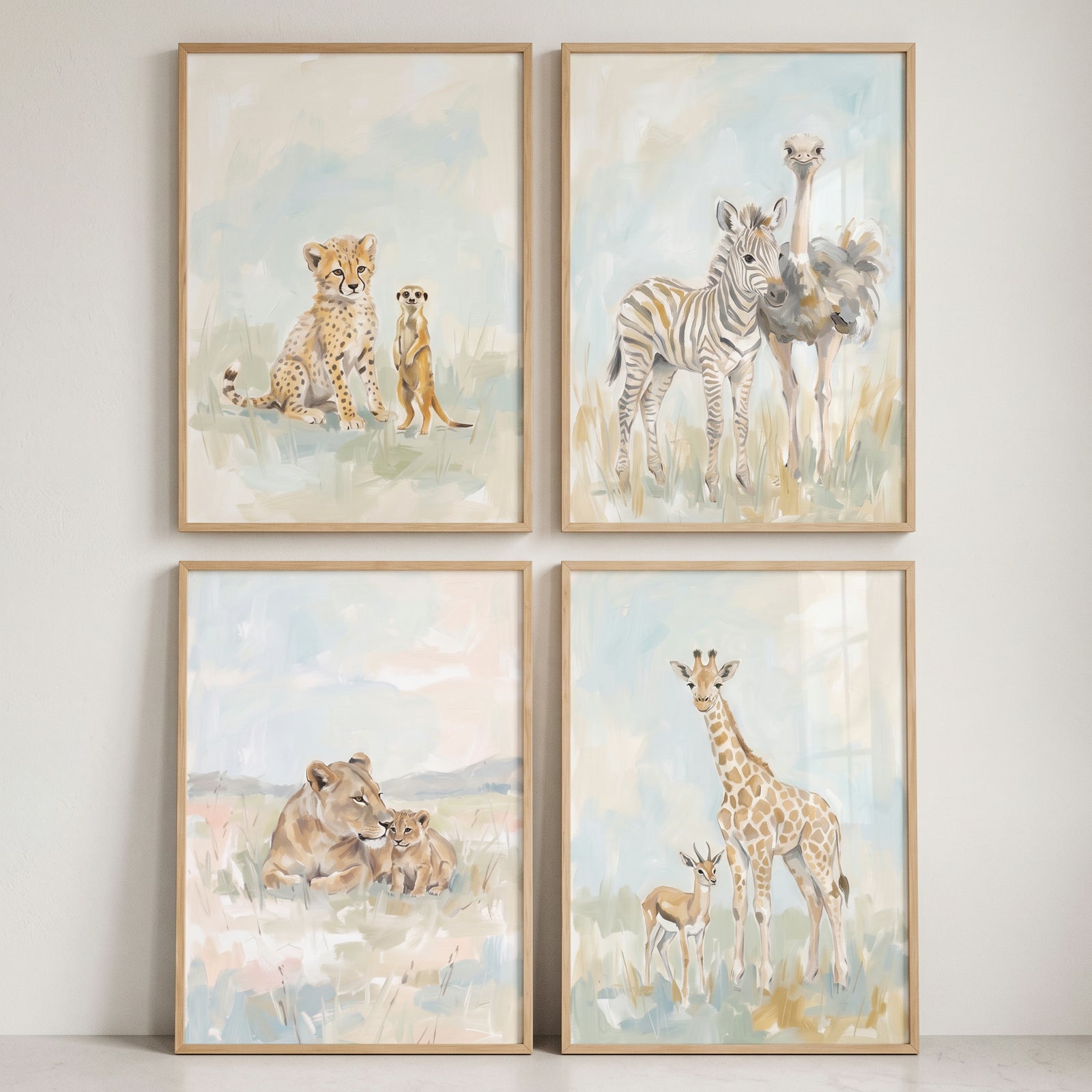 Soft pastel safari animals wall art set of 4 with a cheetah, meerkat, zebra, ostrich, lions, giraffe, and gazelle.
