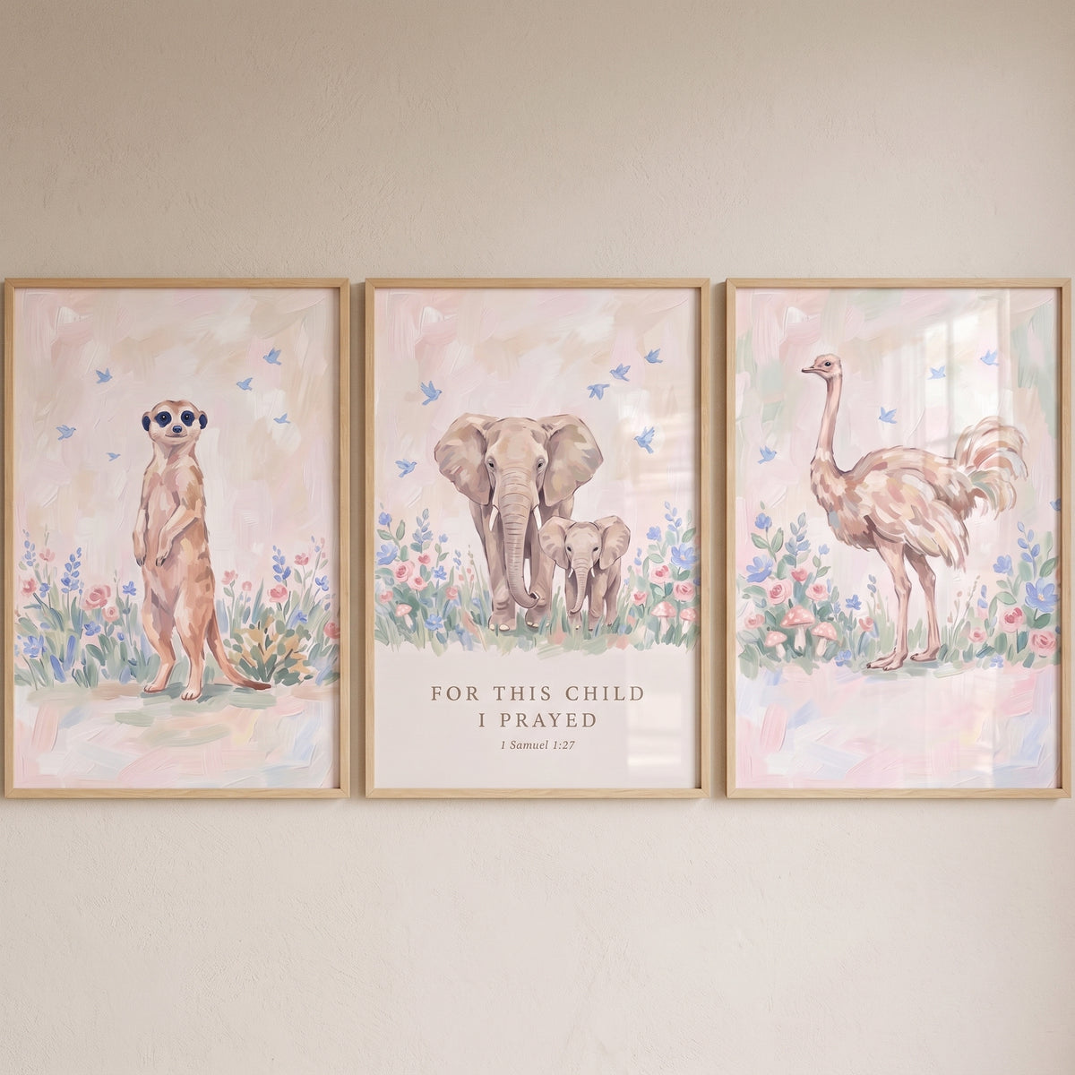 Soft petal safari animals wall art set of 3 featuring a meerkat, elephants with a Bible verse, and an ostrich.
