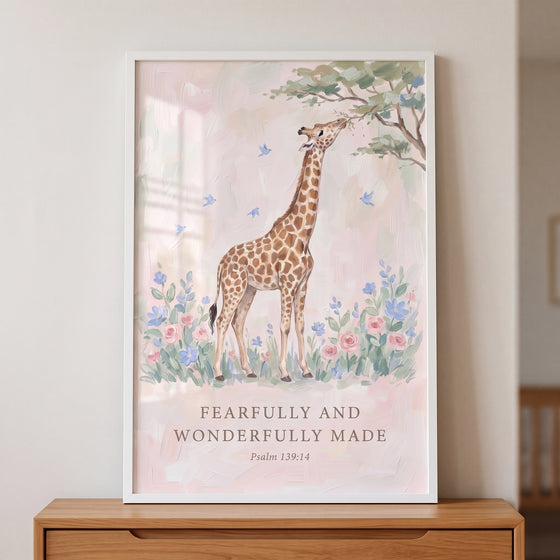 Soft pink floral giraffe wall art featuring a giraffe and the text Fearfully and Wonderfully Made, Psalm 139:14.