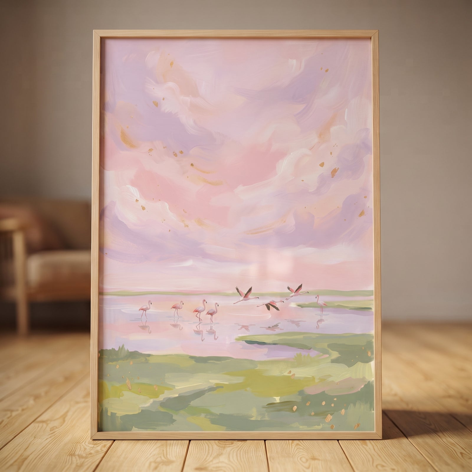 Framed soft pink sky flamingo bird wall art featuring a pastel wetland scene, resting on a light wood floor.