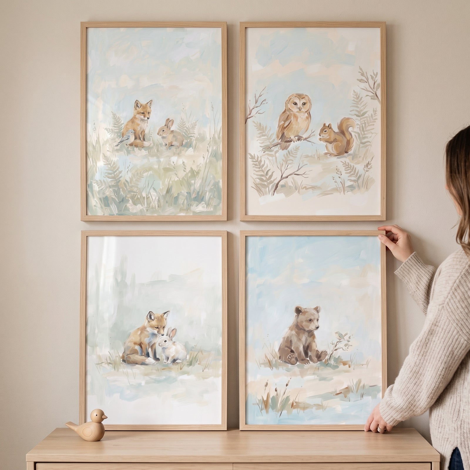 Soft sage forest animals wall art set of 4 featuring watercolor illustrations of a fox, rabbit, owl, squirrel, and bear.