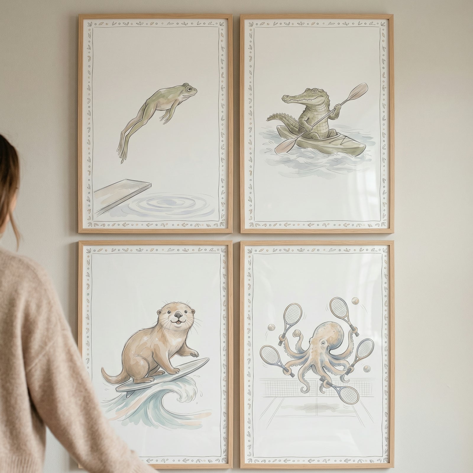 Soft wash sporting animals wall art set of 4 with a diving frog, kayaking alligator, surfing otter, and tennis octopus.