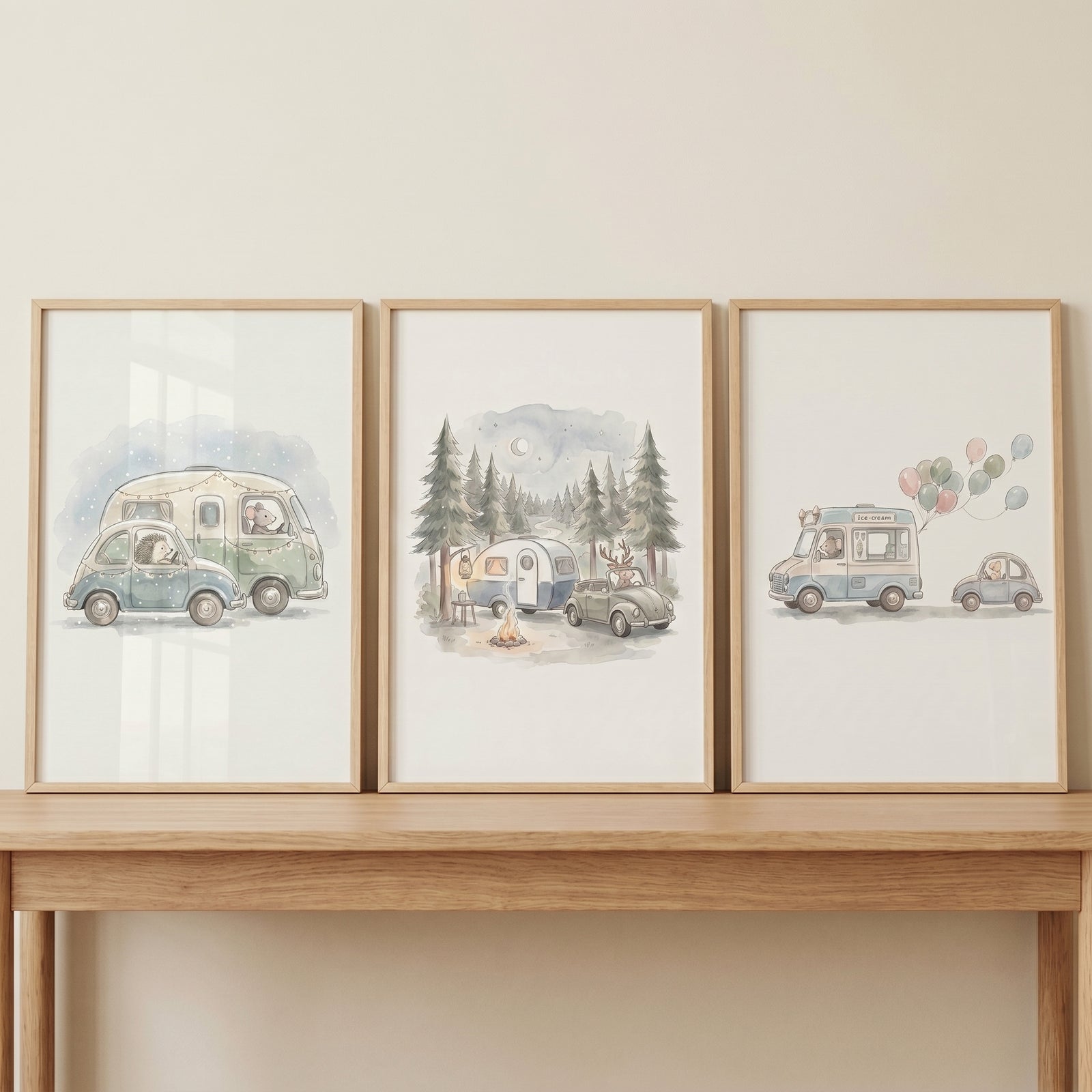 Soft watercolor adventuring animals wall art set of 3 featuring forest creatures in campers and cars on a wooden table.
