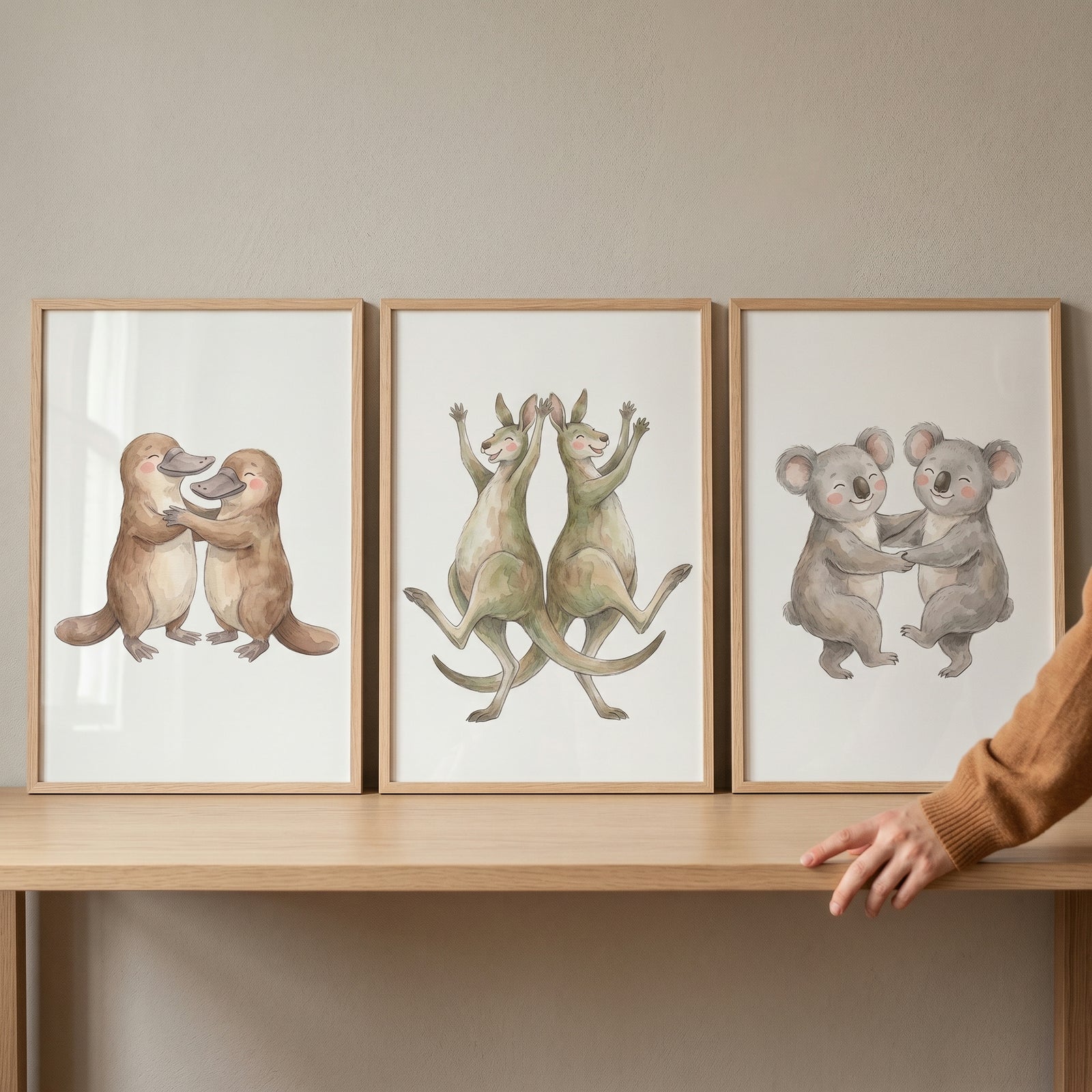 Framed soft watercolor australian animals wall art set of 3 with pairs of platypuses, kangaroos, and koalas.