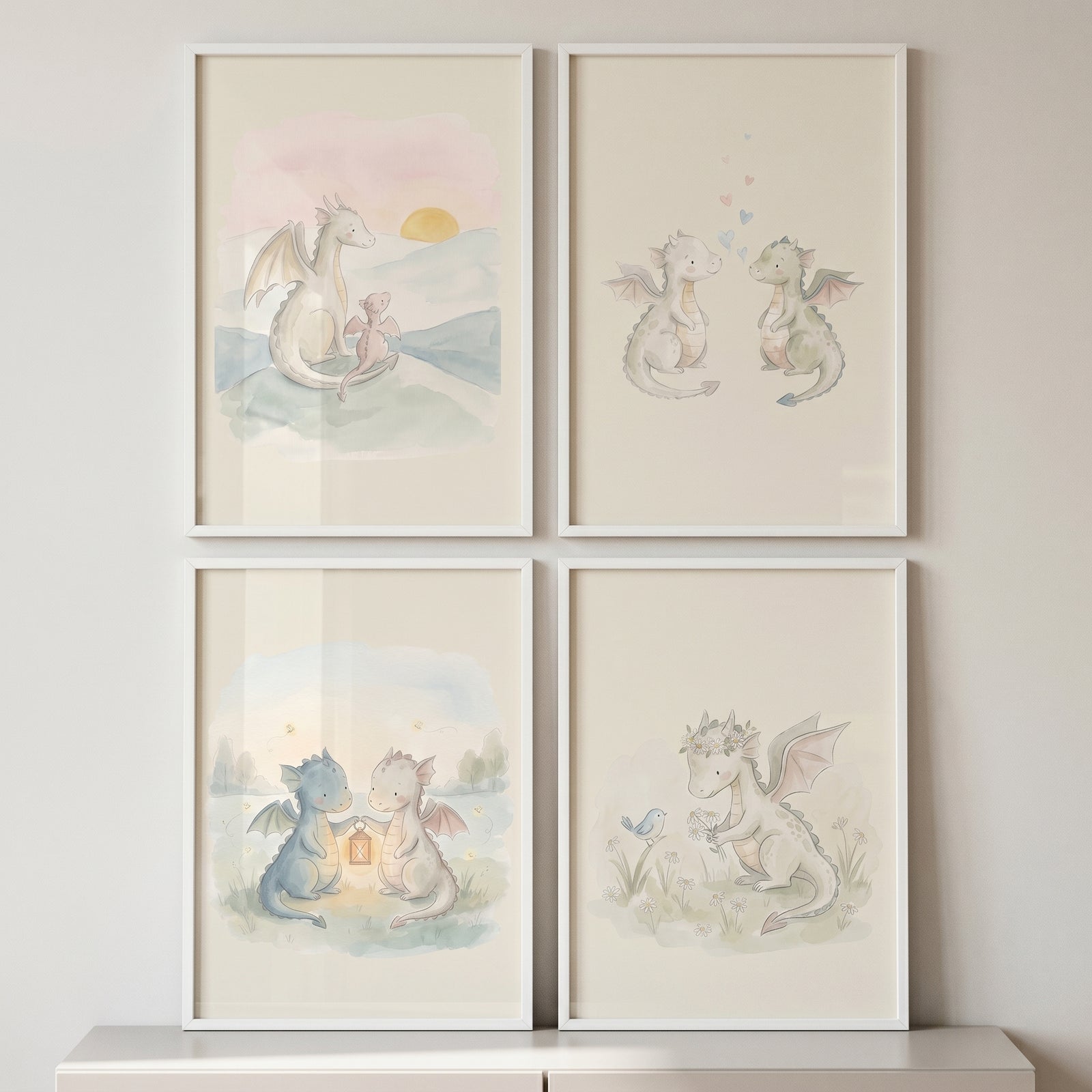 Soft watercolor baby dragon wall art set of 4 in white frames depicts whimsical dragons in various pastel scenes.