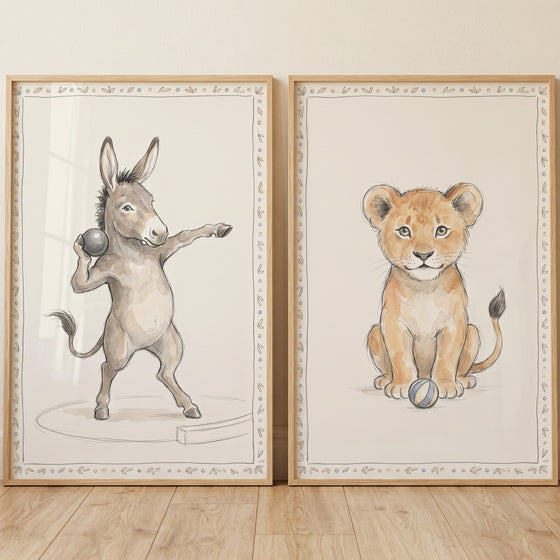 Soft watercolor ball animals wall art set of 2 featuring a standing donkey and a sitting lion cub in wooden frames.