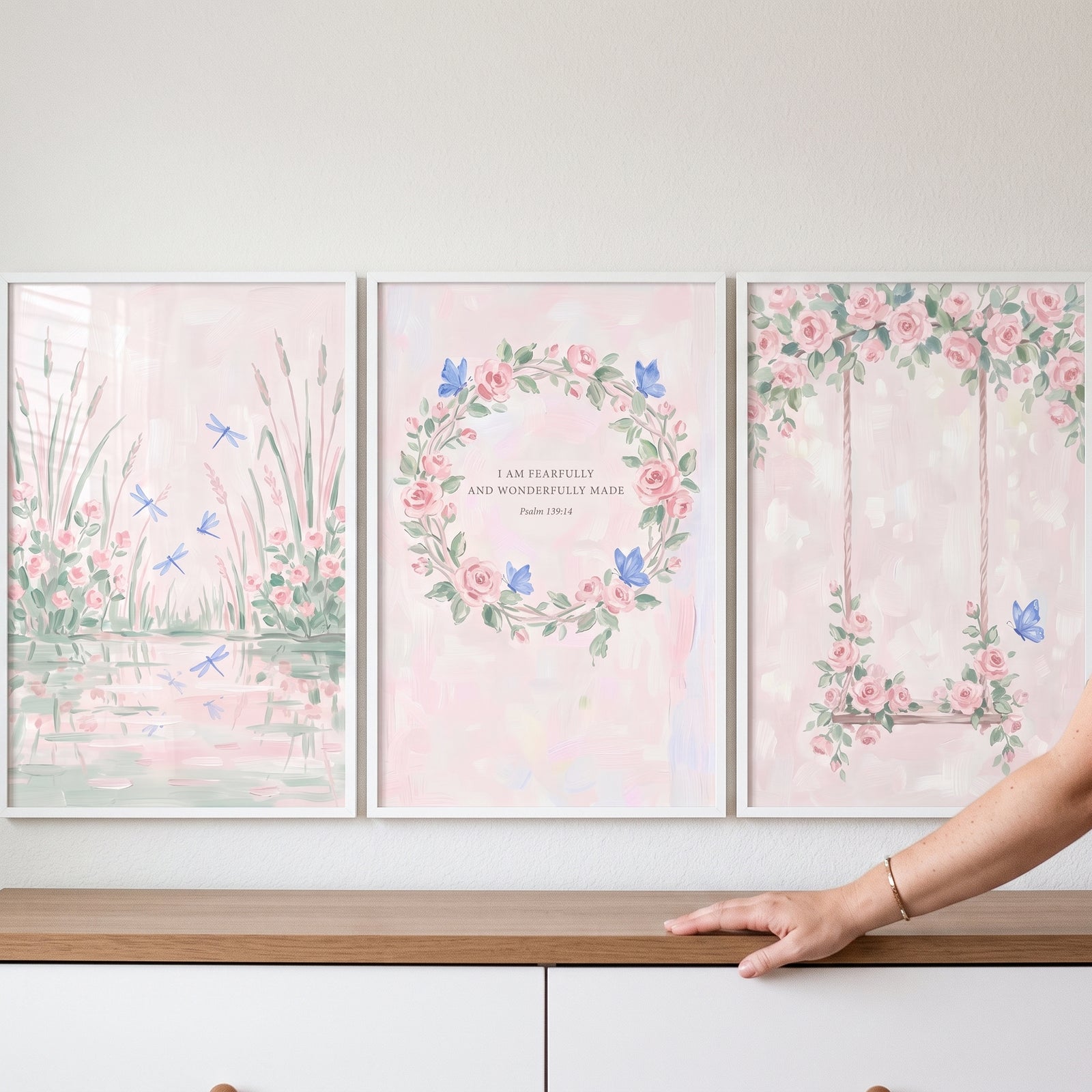Soft watercolor blue insect wall art set of 3 with pink roses, butterflies, dragonflies, and a garden swing.