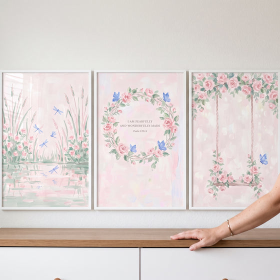 Soft watercolor blue insect wall art set of 3 with pink roses, butterflies, dragonflies, and a garden swing.