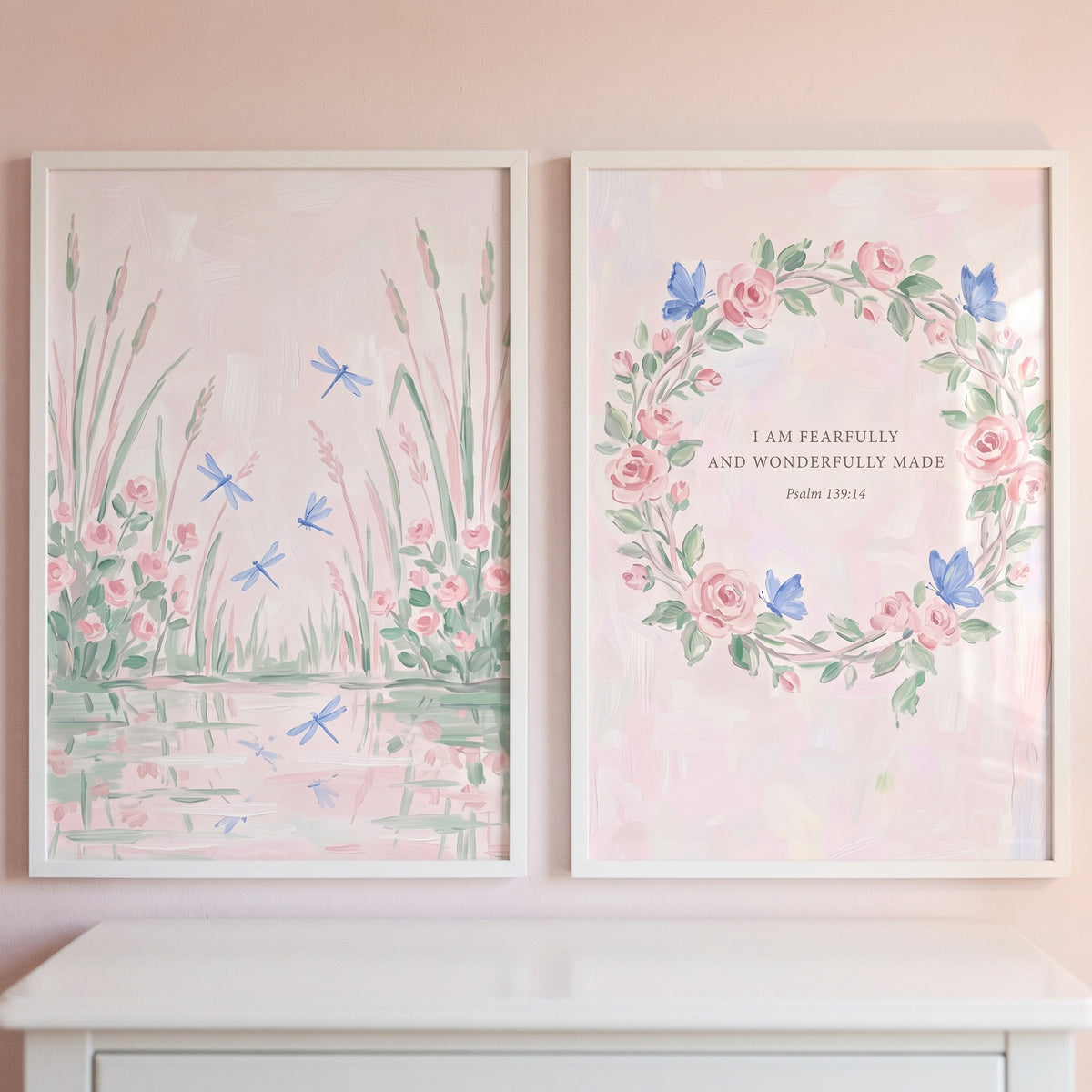 Soft watercolor pink garden wall art set of 2 with dragonflies by a pond and Psalm 139:14 verse inside a floral wreath.