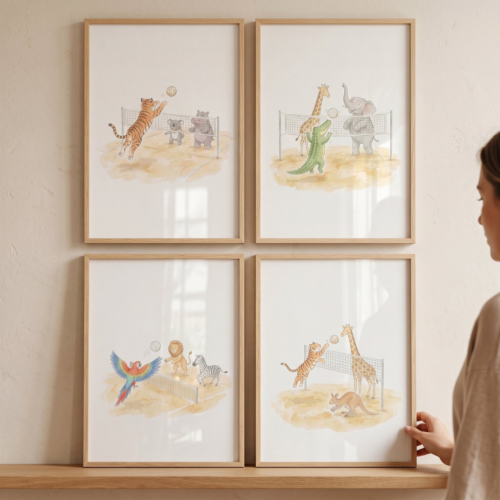 Soft watercolor volleyball animals wall art set of 4 features safari animals playing sports in light wood frames.