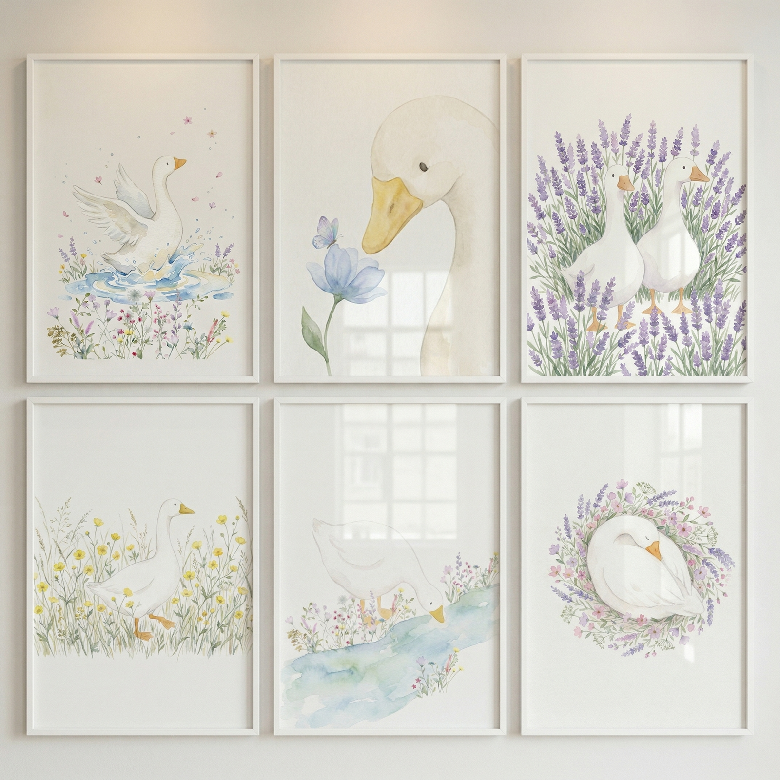 Six framed watercolor illustrations arranged in a grid feature white ducks in soft nature scenes including splashing in water standing among flowers drinking from a stream and resting in a floral wreath. The pastel colors and gentle details create a cohesive calm nursery wall display with a sweet countryside feel.