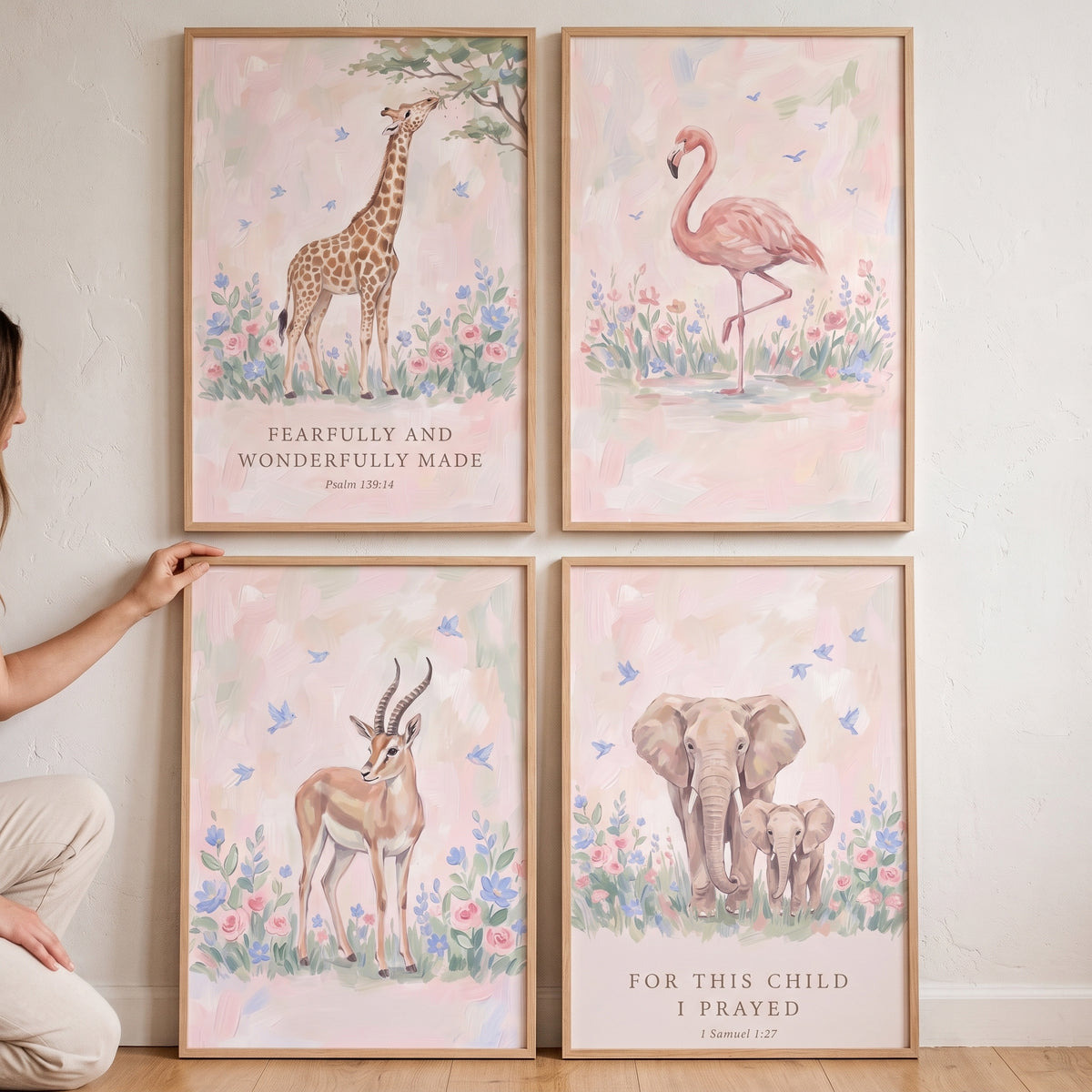 Soft wildflower african animals wall art set of 4 featuring a giraffe, flamingo, antelope, and elephant with scripture.