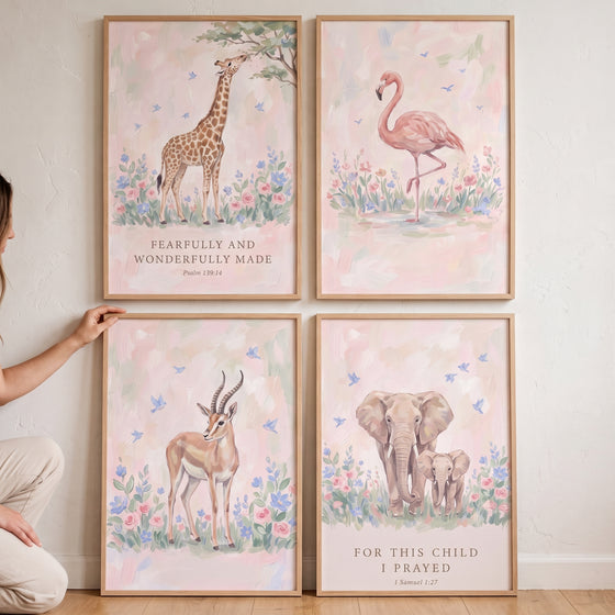 Soft wildflower african animals wall art set of 4 featuring a giraffe, flamingo, antelope, and elephant with scripture.