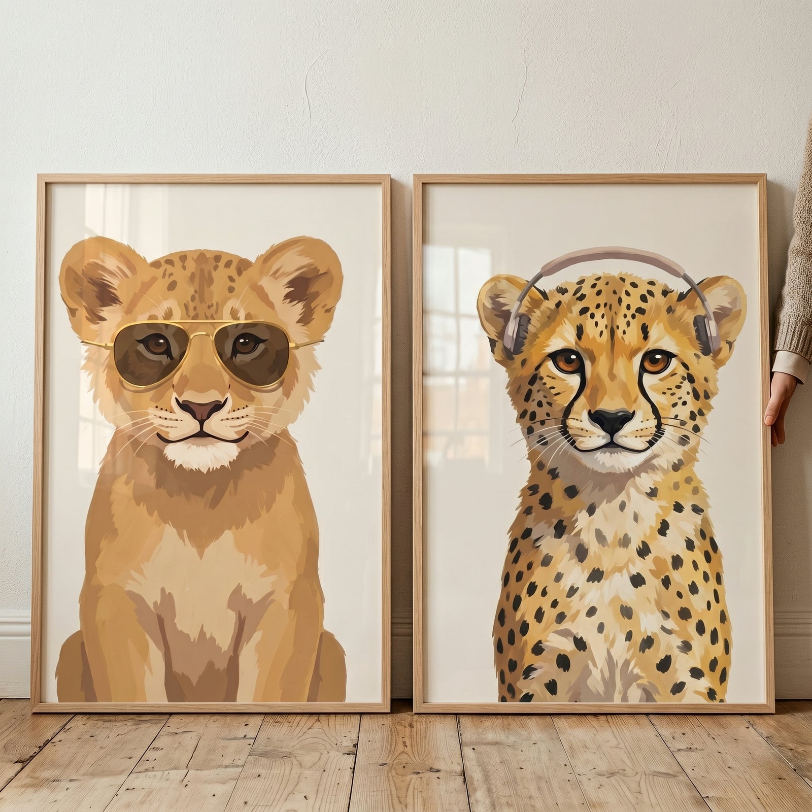 Sophisticated baby safari animal artwork set of 2 with a lion cub in sunglasses and a cheetah cub in headphones.