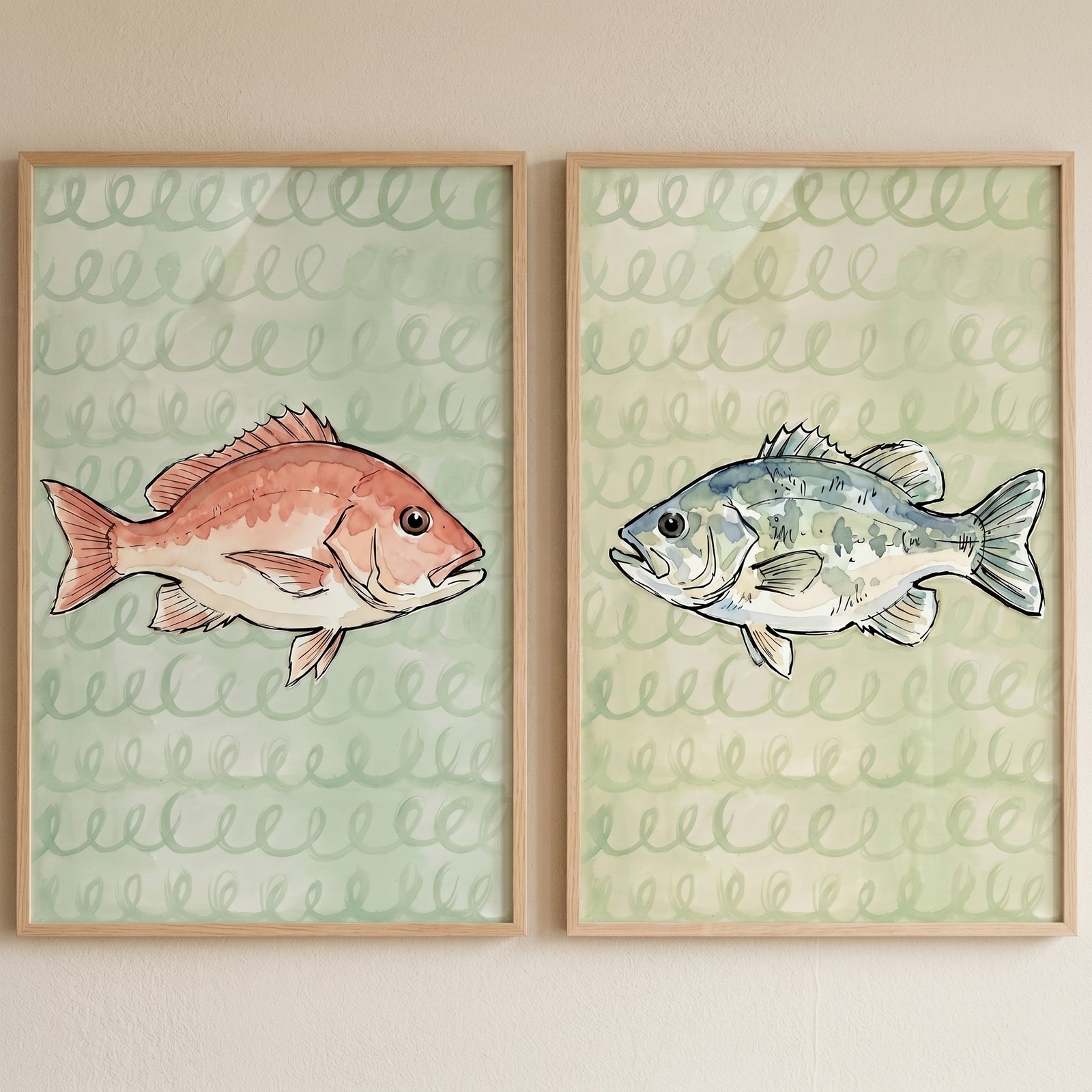 Sophisticated coastal watercolor fish wall art set of 2 with red and blue-grey fish on light green wave patterns.