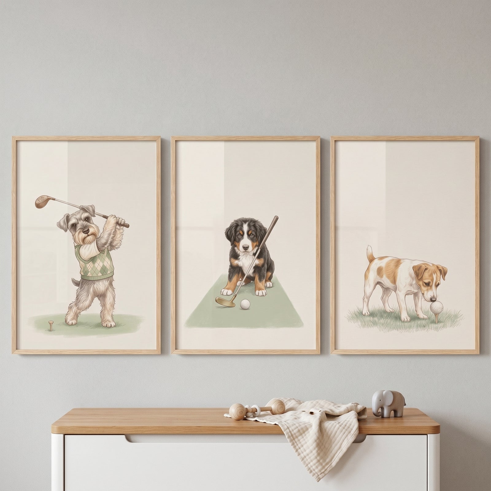 Sophisticated fairway golfing dogs artwork set of 3 features various dogs playing golf in light wood frames on a wall.