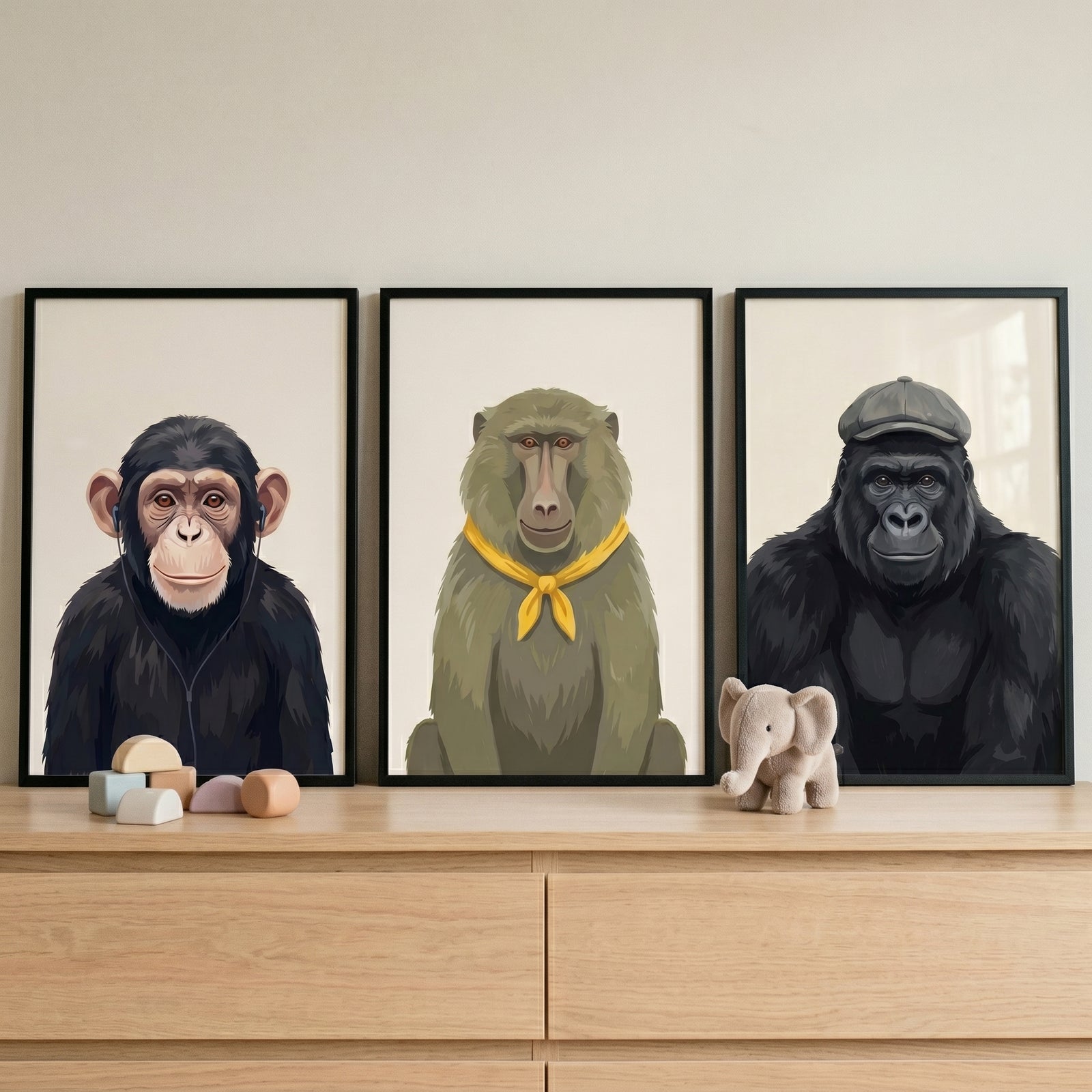 Sophisticated monkey wall art set of 3 featuring a chimp, baboon, and gorilla above a wooden dresser with toys.