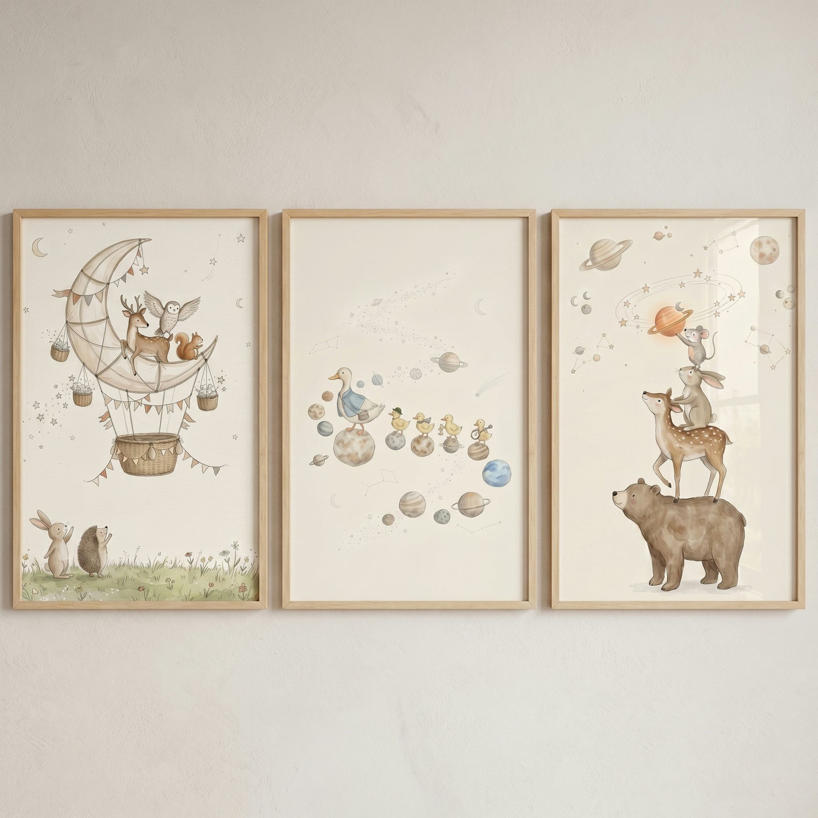 Sophisticated neutral celestial animals wall art set of 3 with watercolor woodland creatures, planets, and a moon balloon.