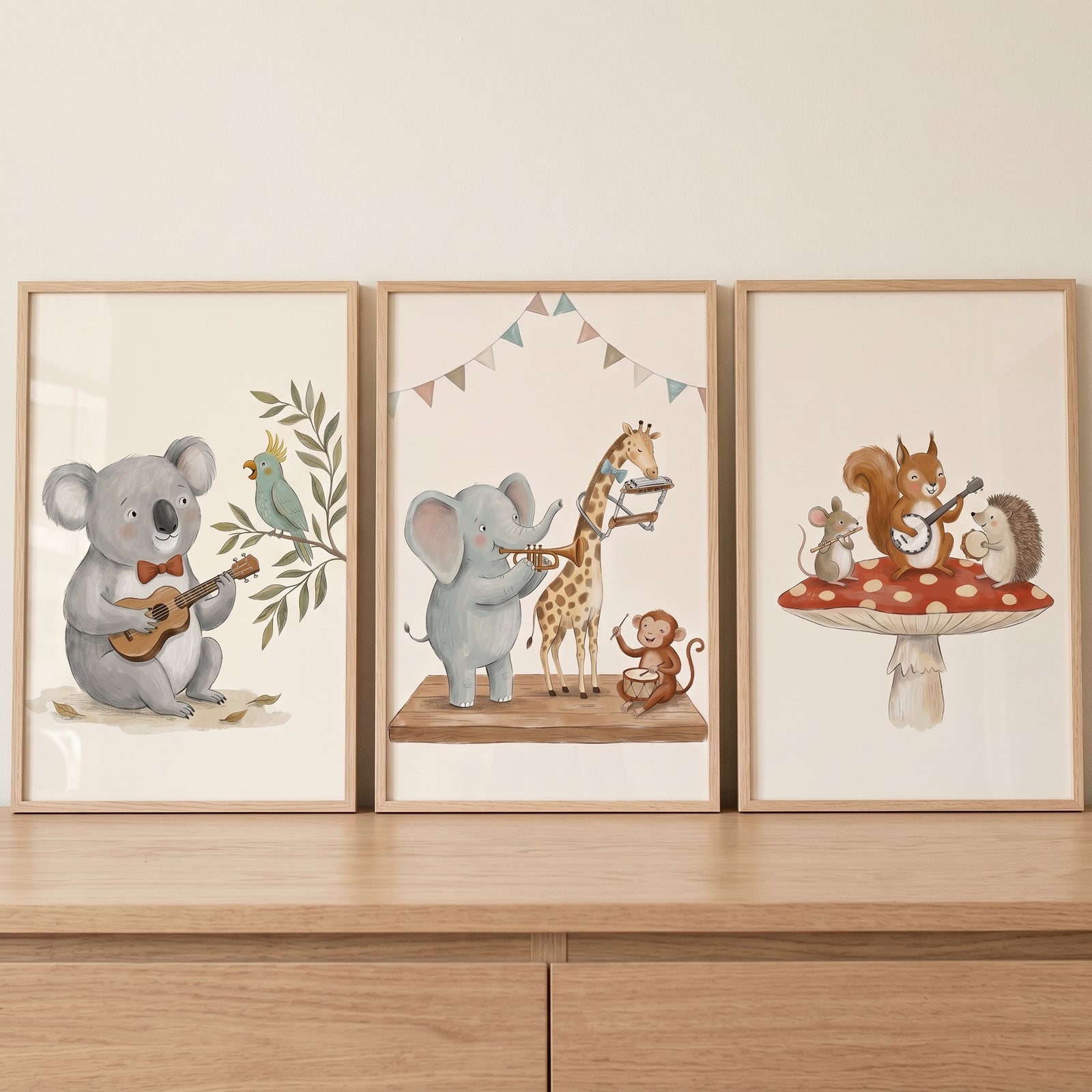 Sophisticated neutral musical animal wall art set of 3 featuring a koala, elephant, and squirrel playing instruments.
