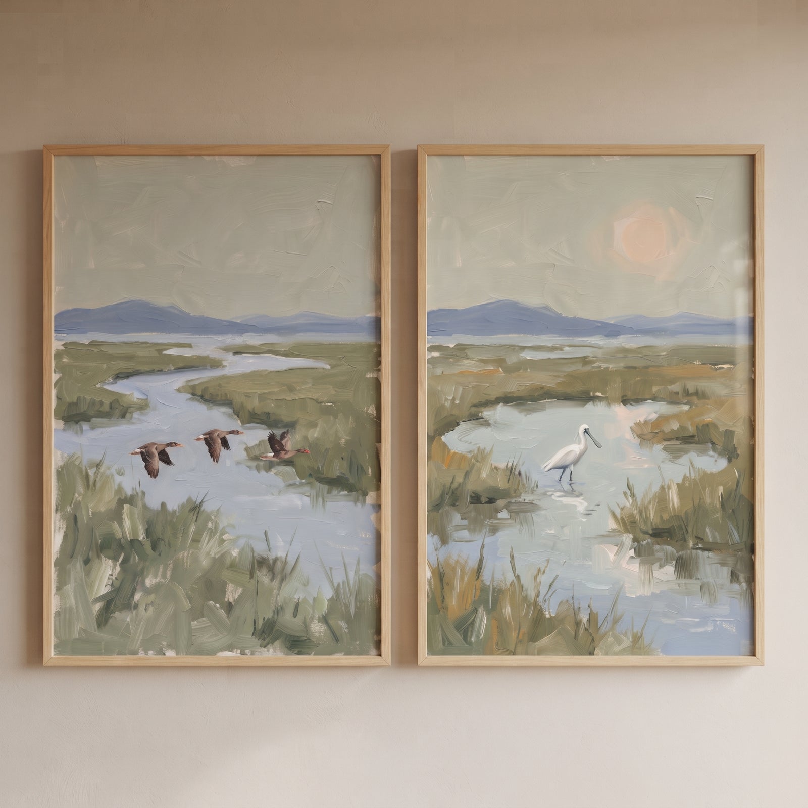 Sophisticated sage marsh bird wall art set of 2 depicts flying ducks and a wading bird in a serene wetland landscape.