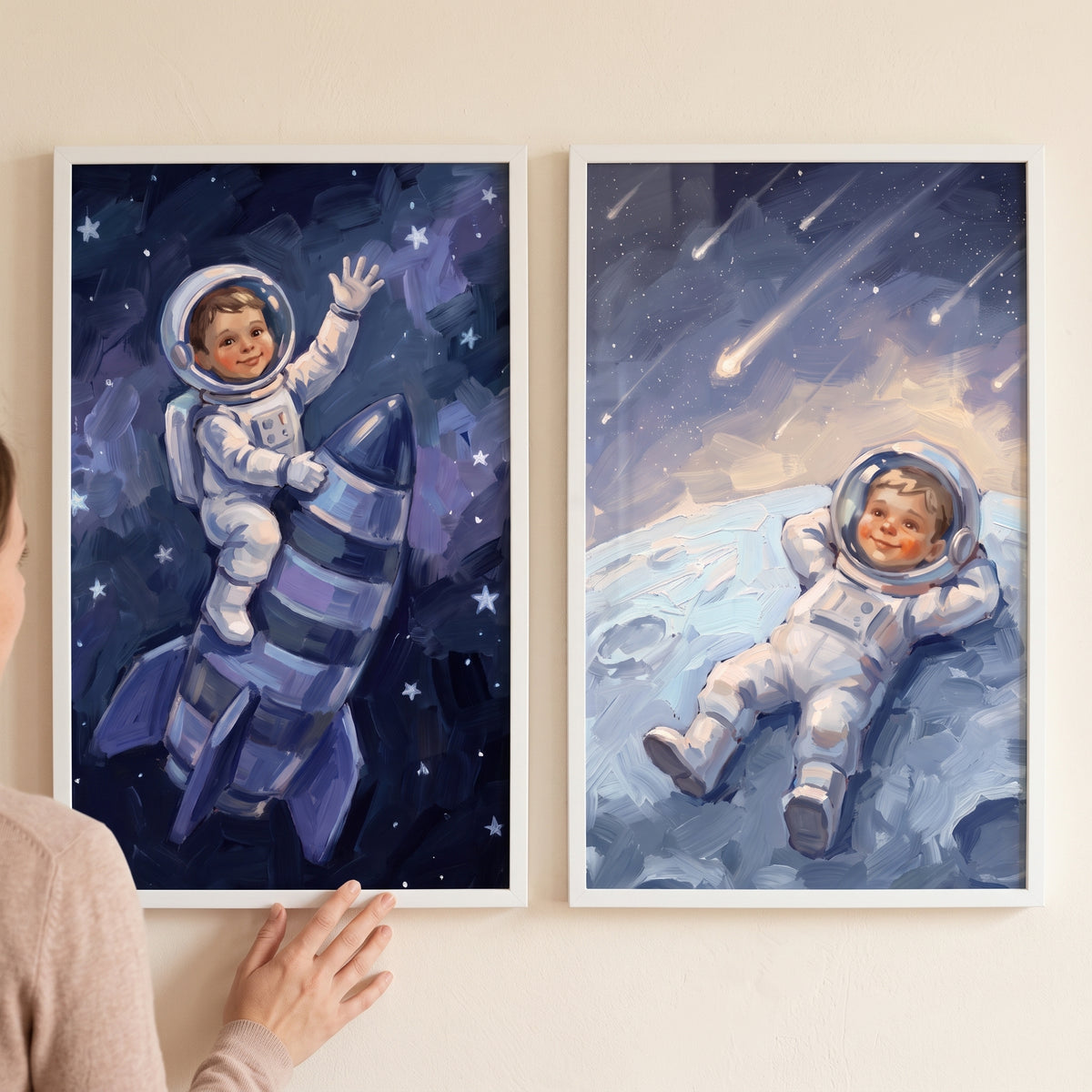 Sophisticated space baby astronaut wall art set of 2 showing a baby riding a rocket and another resting on the moon.